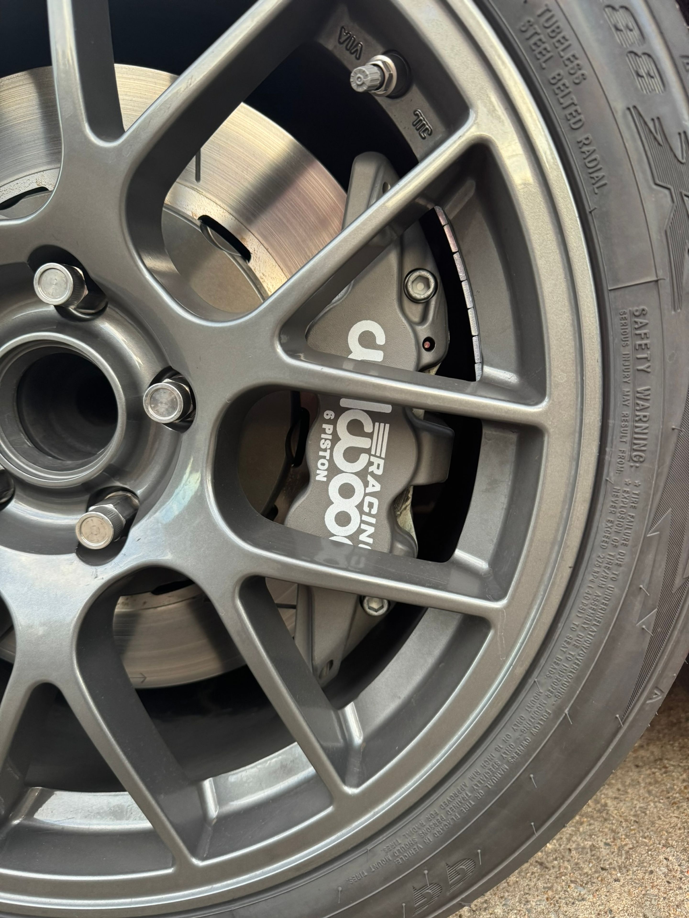 Red Chevrolet C5 Corvette Z06 with 18" EC-7 Apex wheels in Anthracite