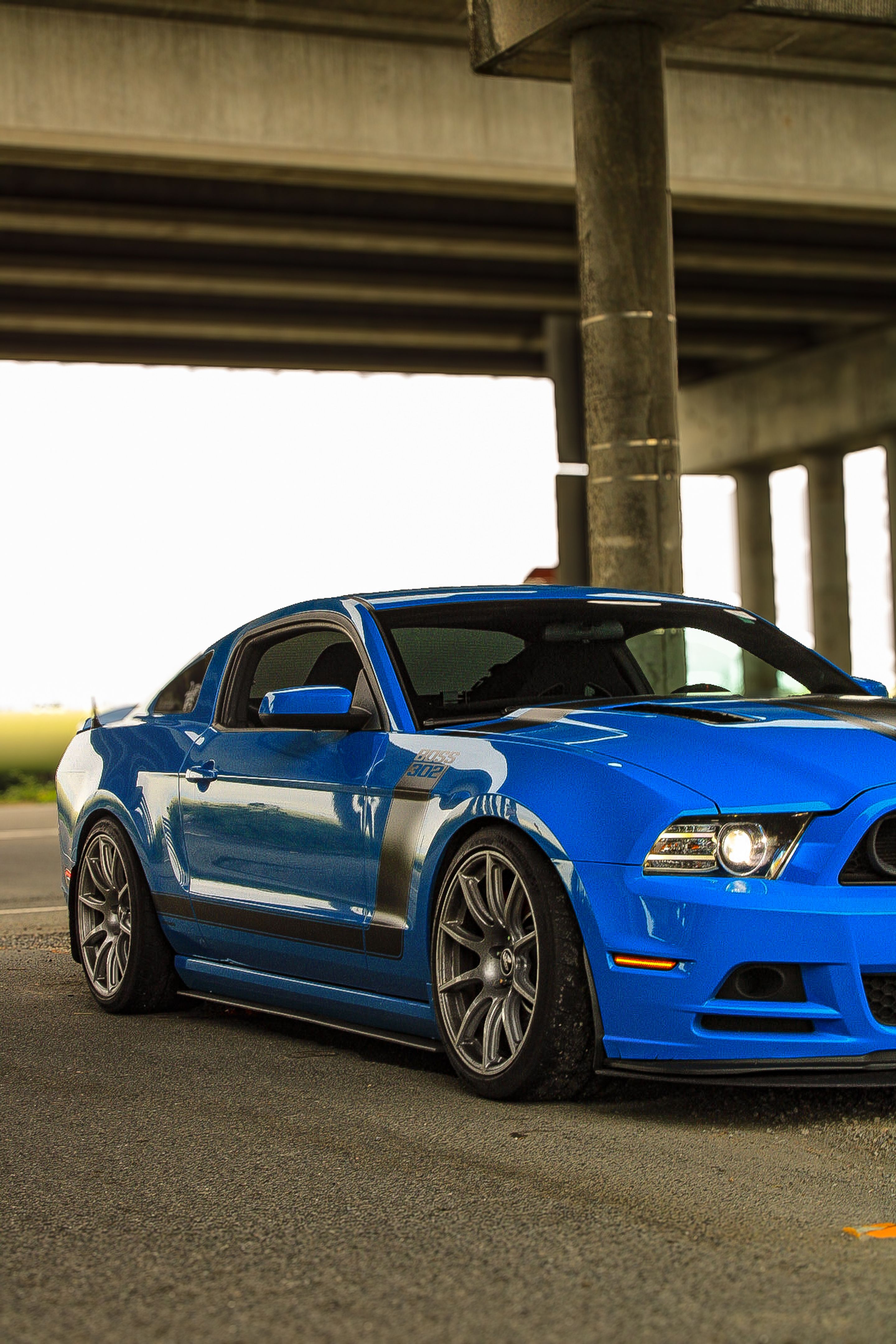 Blue Ford S197 Mustang Boss 302 with 19" SM-10 Apex wheels in Race Silver