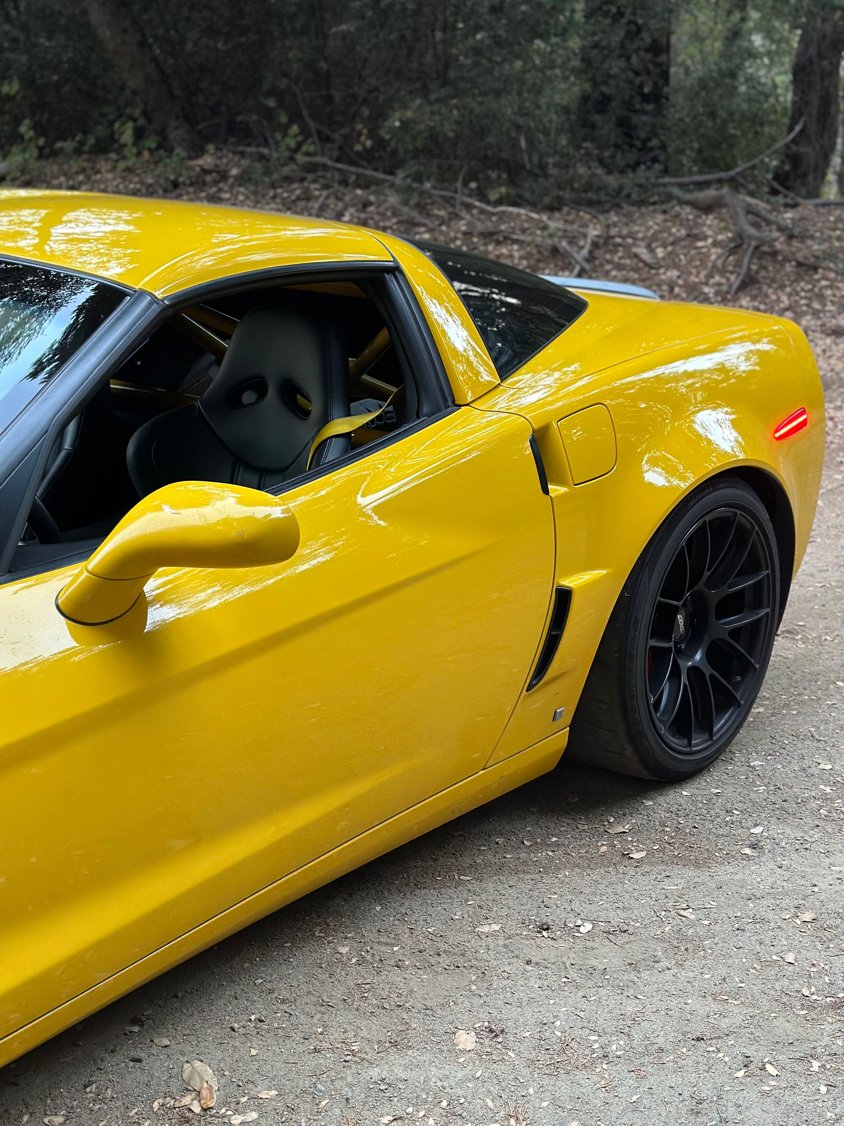 Yellow Chevrolet C6 Corvette Z06 with 19" EC-7RS Apex wheels in Satin Black