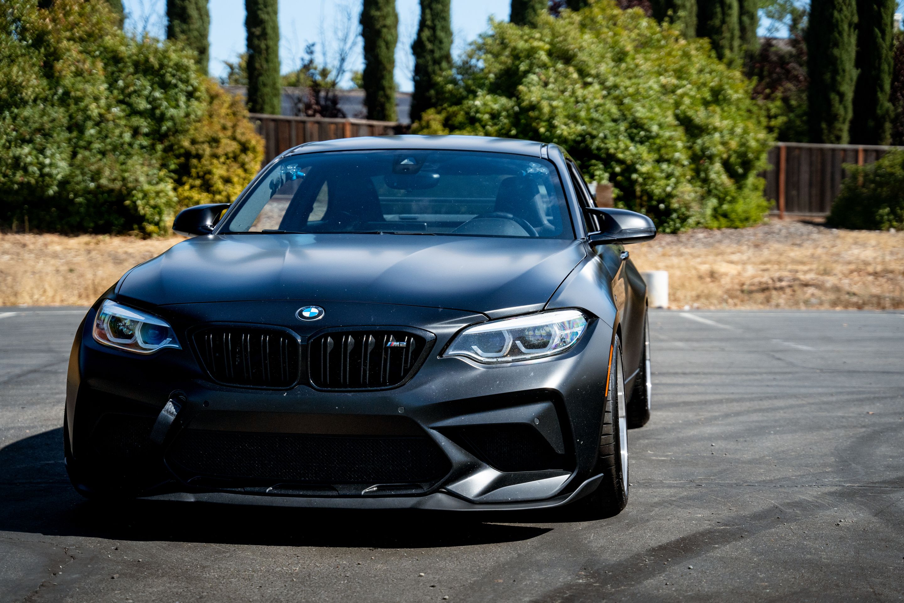 Black BMW F87 M2 with 18" ML-10RT Apex wheels in Machined Lip Gloss Motorsport Gold