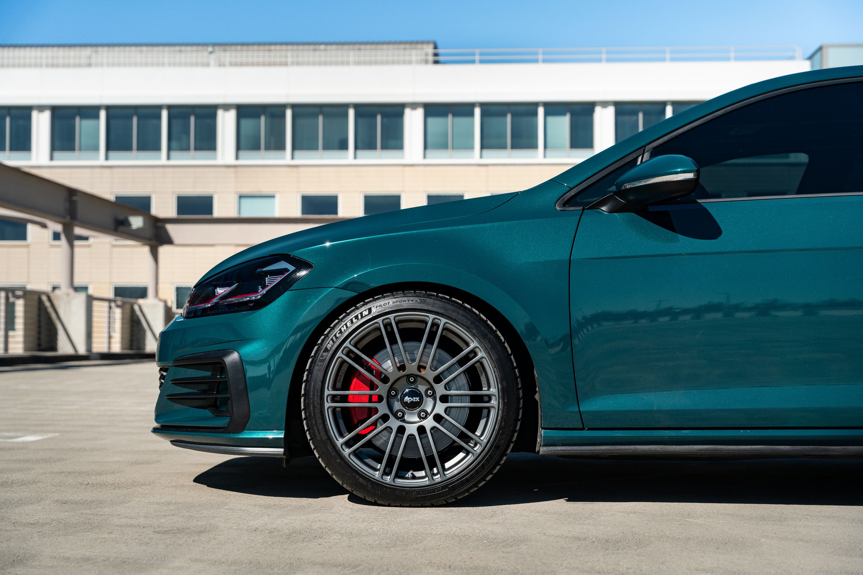 Green VW MK7 GTI with 18" TC-10RT Apex wheels in Anthracite