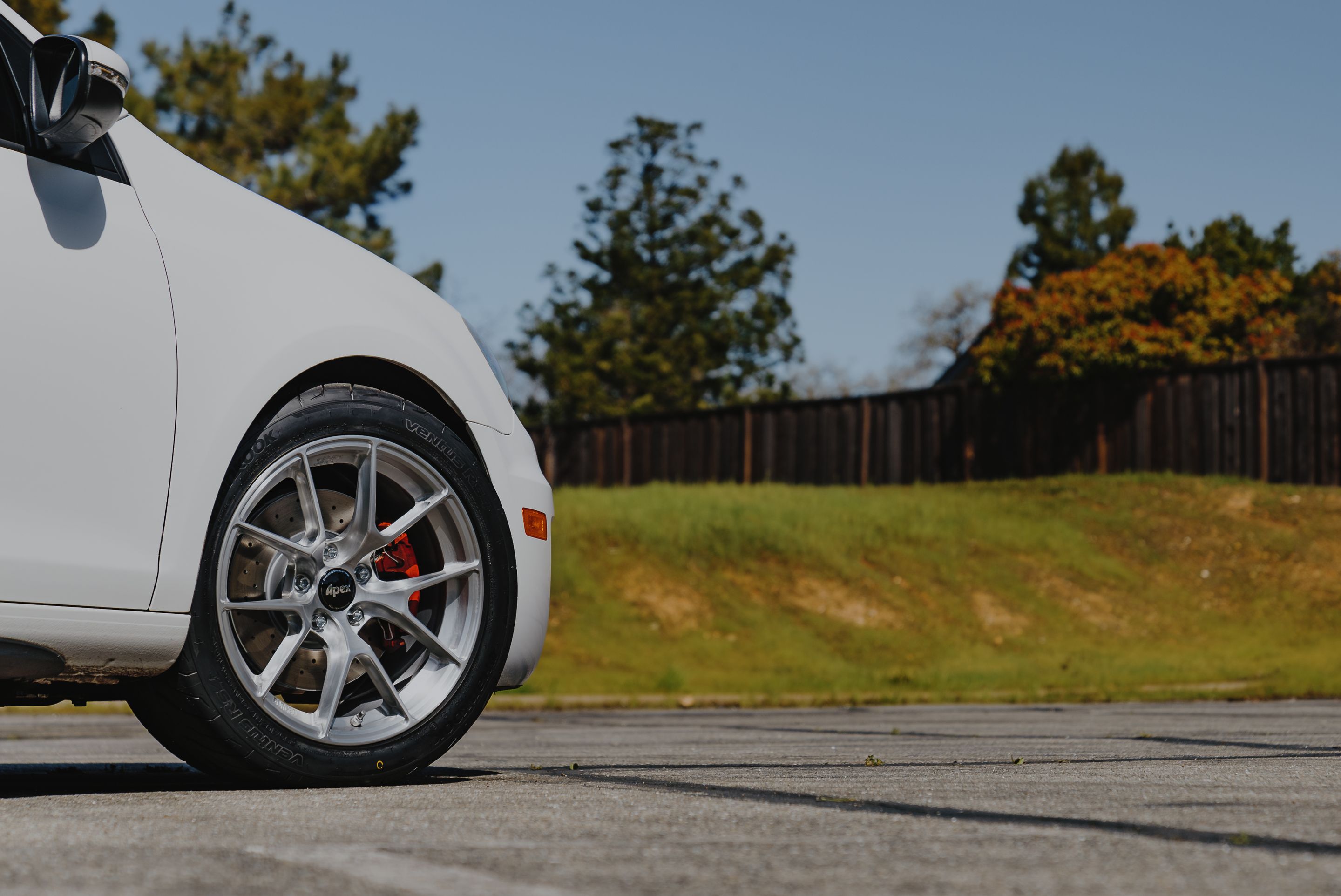 White VW MK6 GTI with 17" VS-5RS Apex wheels in Brushed Clear
