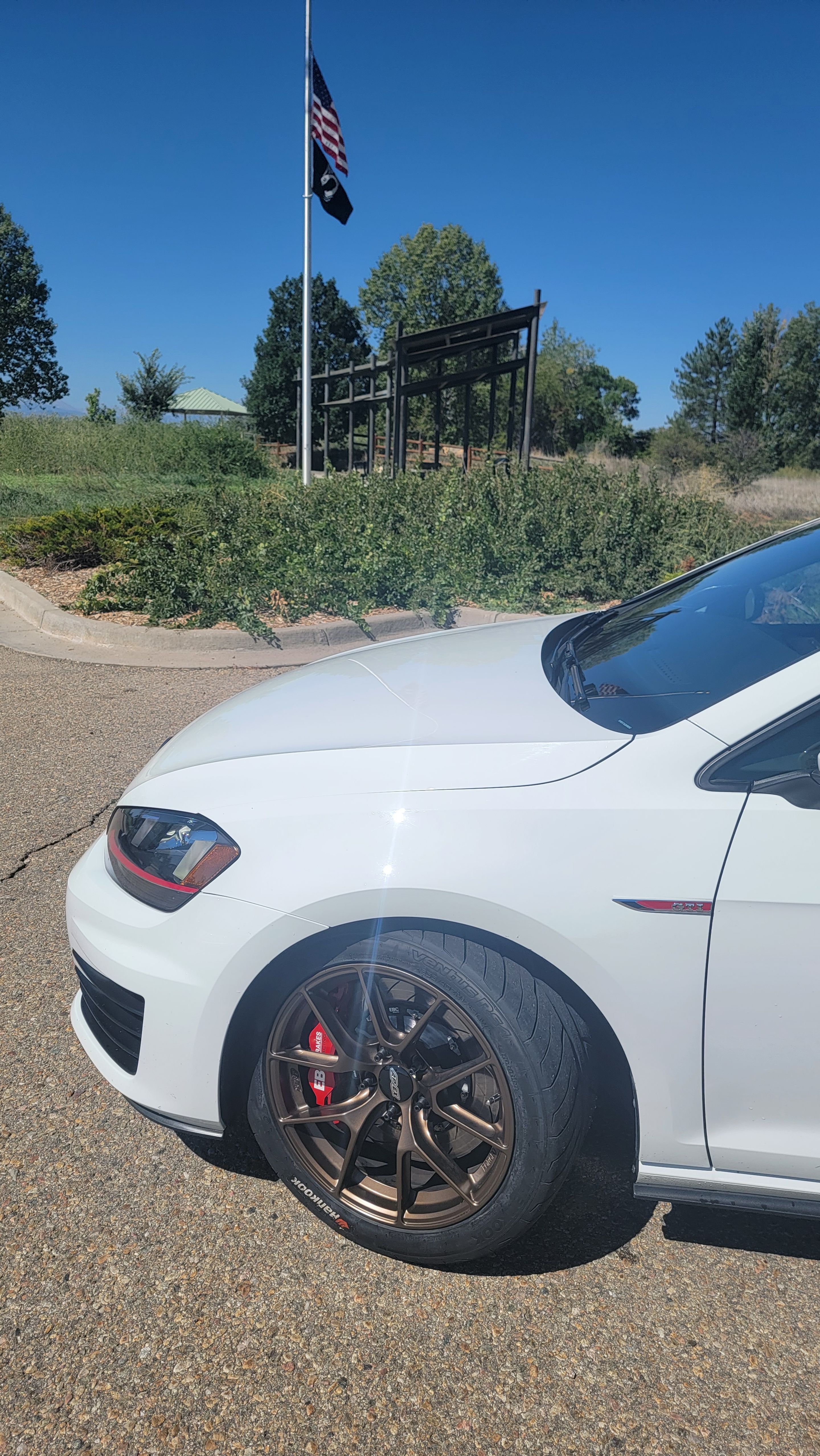 White VW MK7 GTI with 17" VS-5RS Apex wheels in Satin Bronze