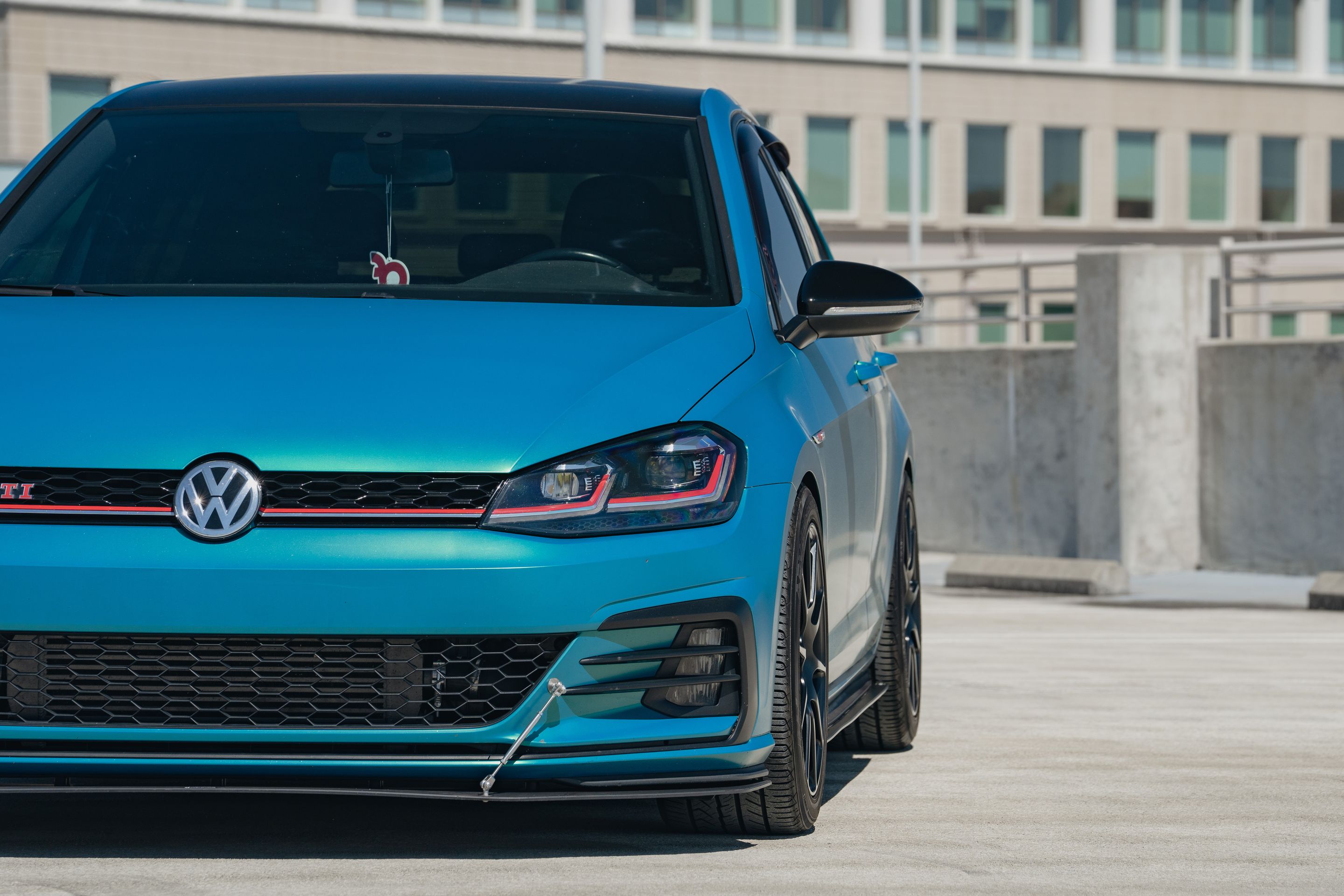 Green VW MK7 GTI with 17" SM-10 Apex wheels in Satin Black