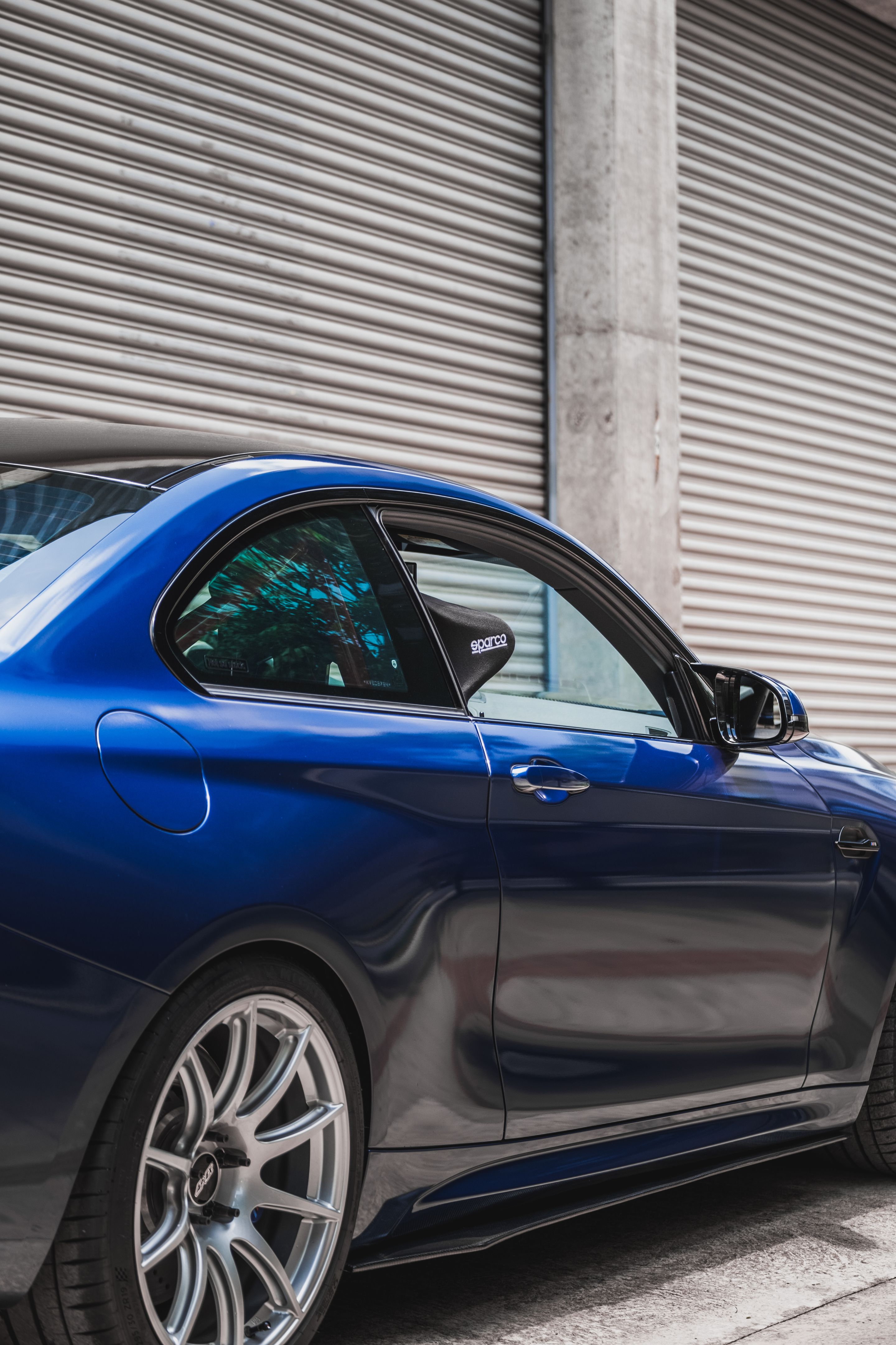 Blue BMW F87 M2 with 19" SM-10 Apex wheels in Race Silver