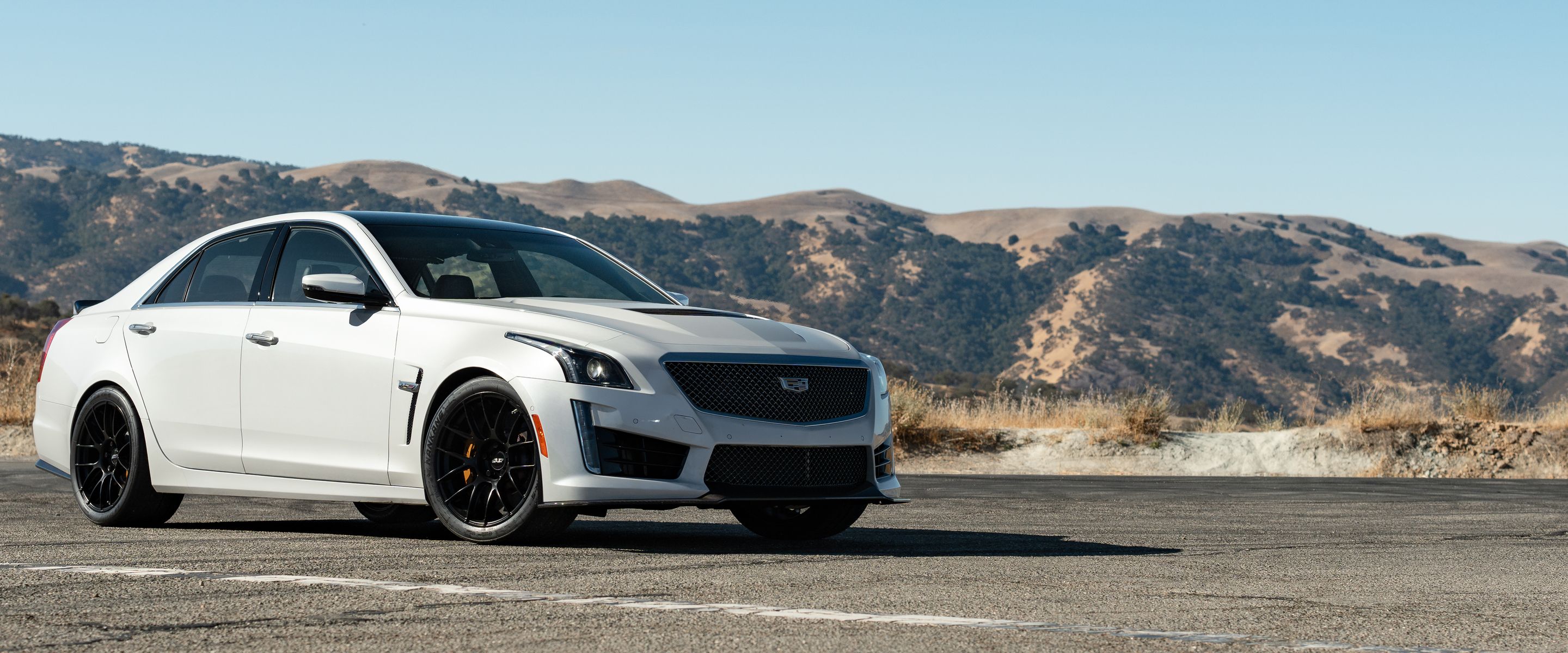 White Cadillac Gen 3 CTS-V with 19" EC-7RS Apex wheels in Satin Black