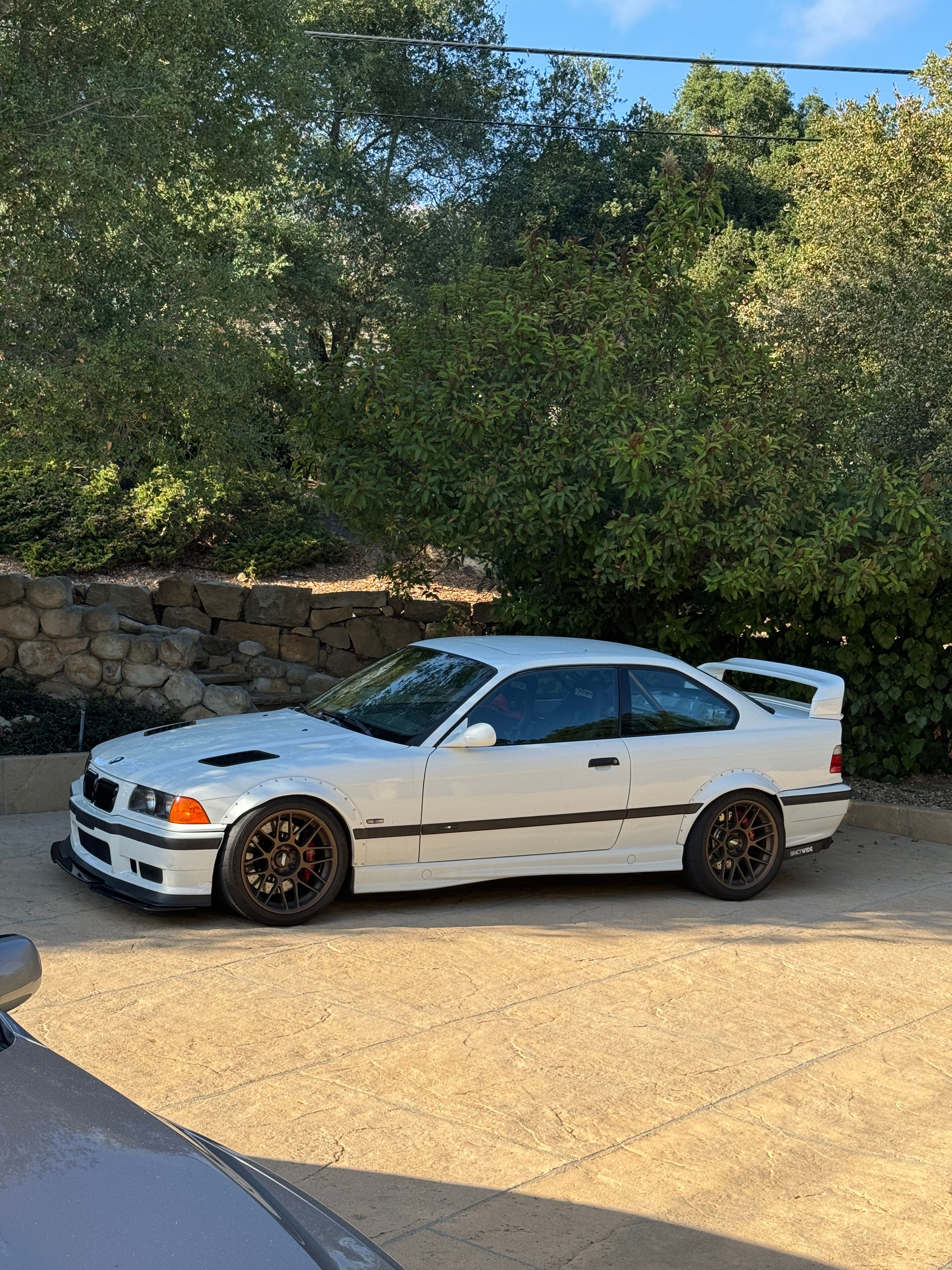 White BMW E36 M3 with 18" ARC-8 Apex wheels in Satin Bronze