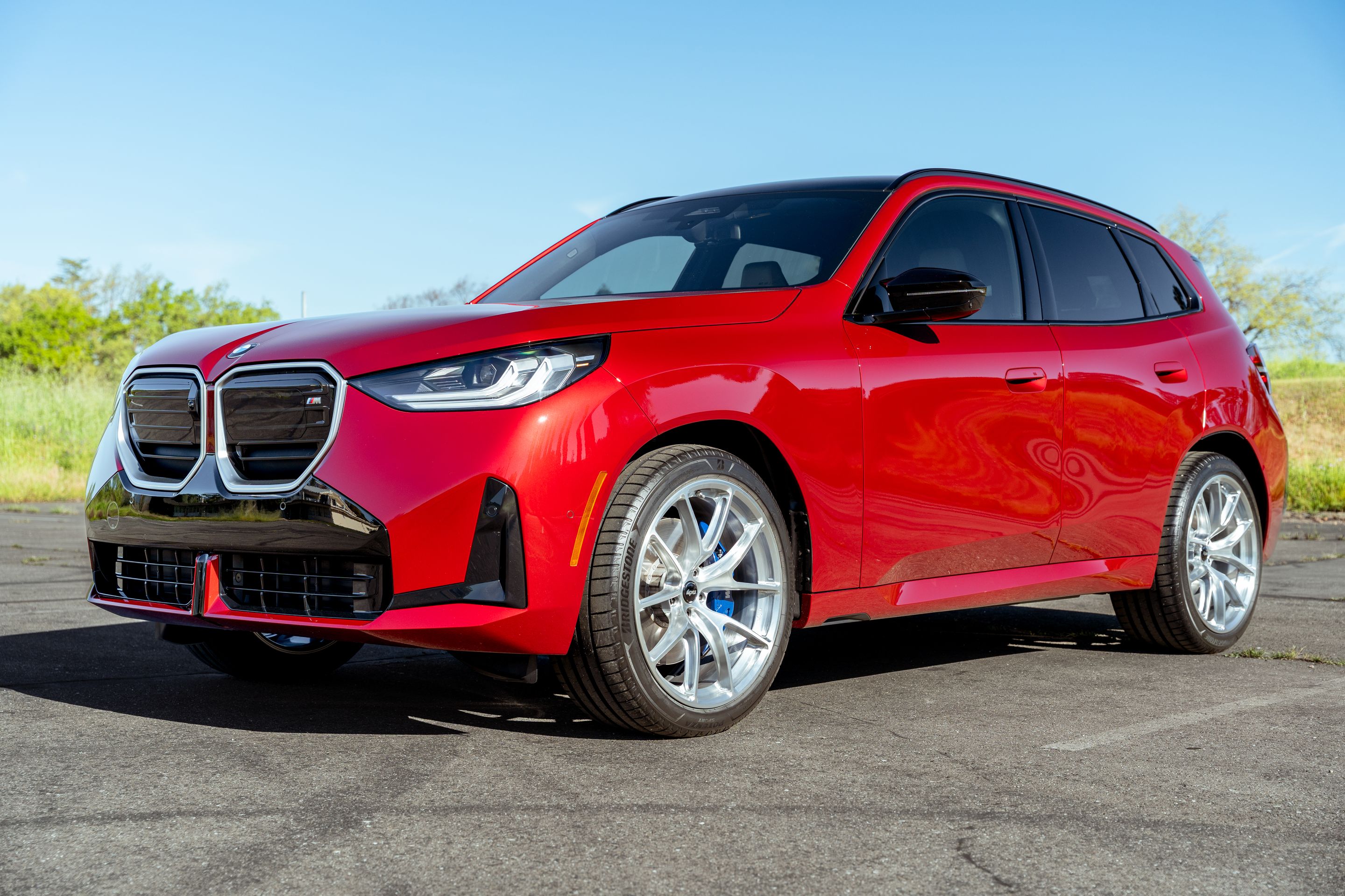 Red BMW G45 X3 with 21" VS-5RX Apex wheels in Brushed Clear