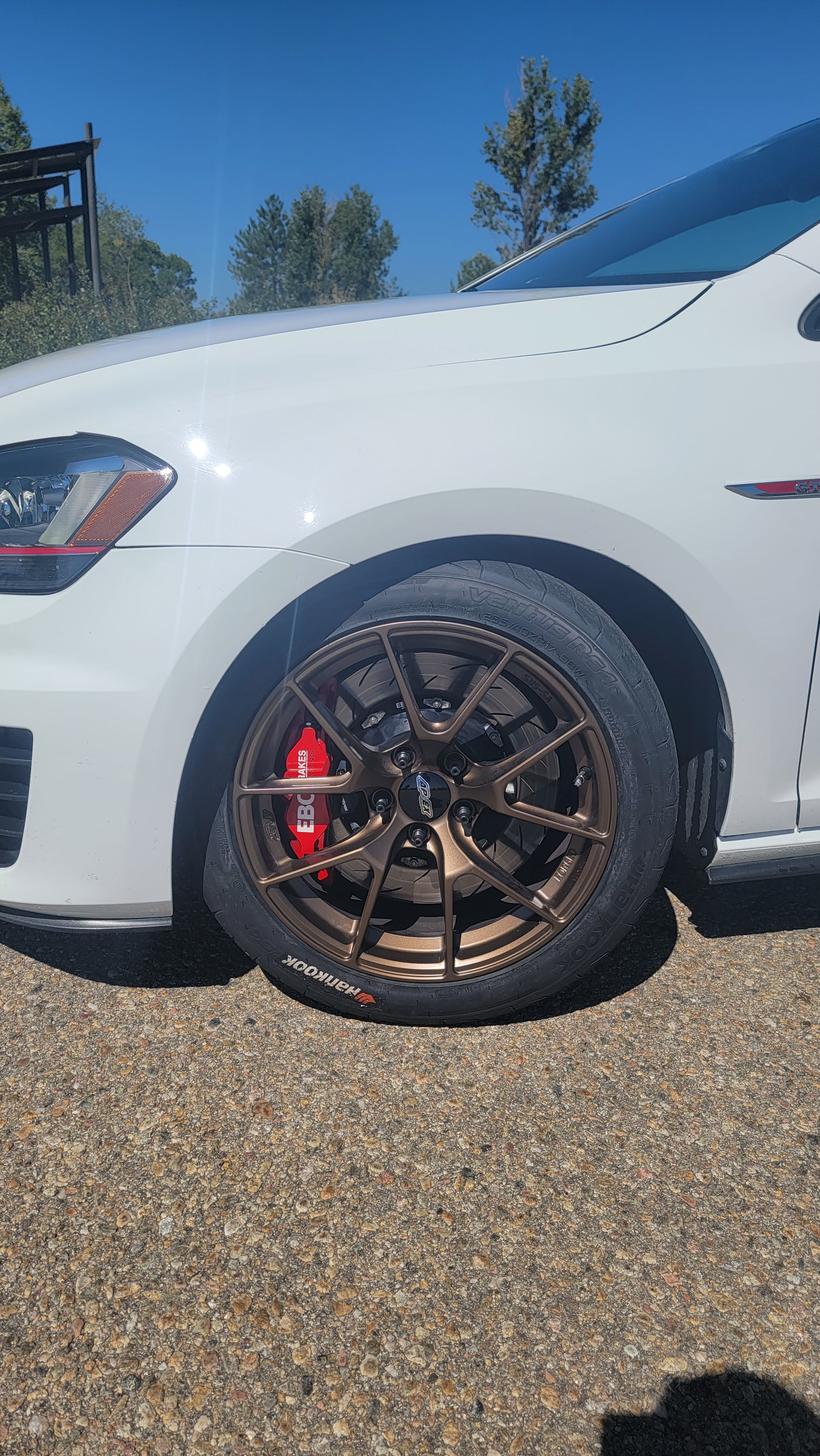 White VW MK7 GTI with 17" VS-5RS Apex wheels in Satin Bronze