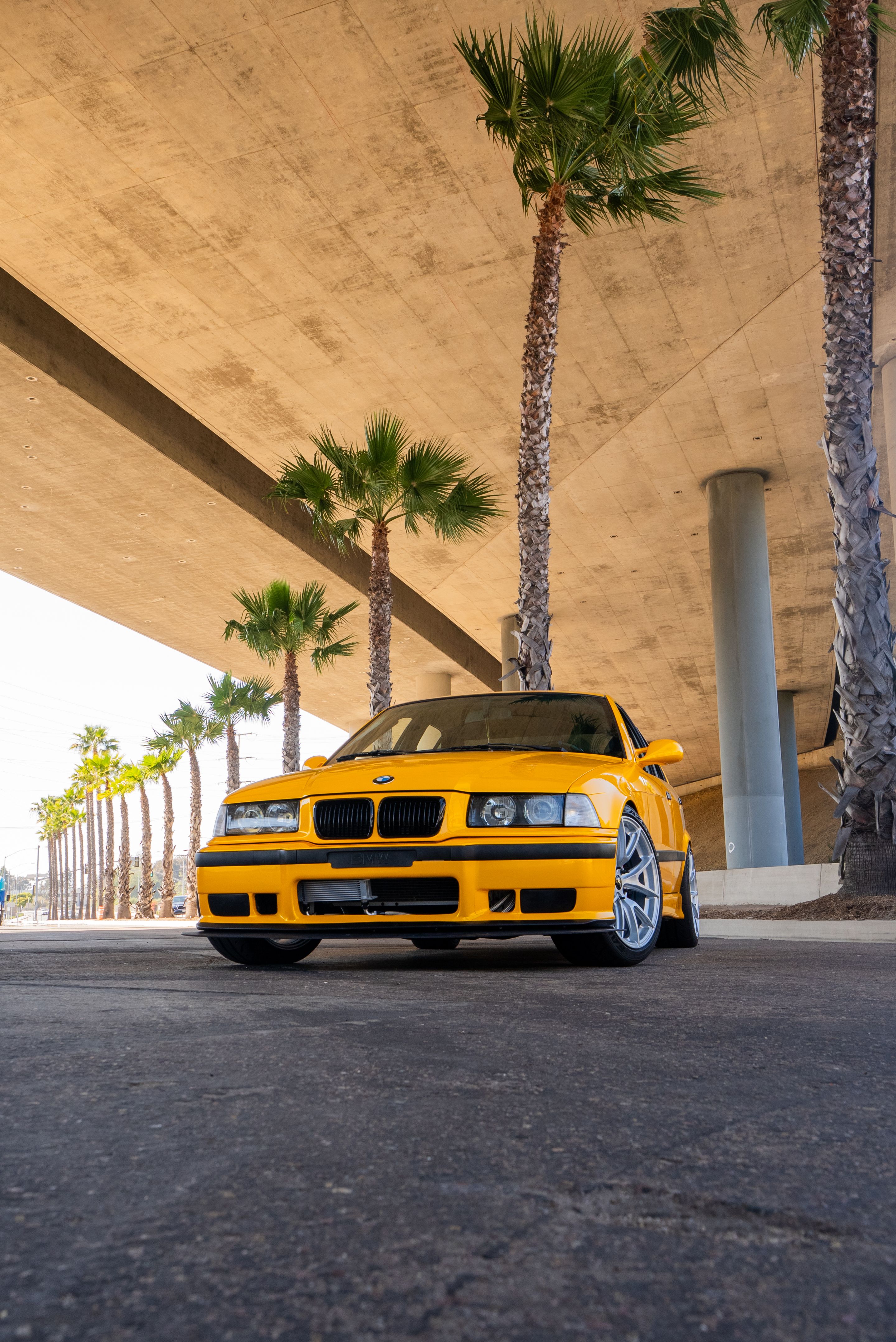 Yellow BMW E36 M3 with 18" VS-5 Apex wheels in Race Silver