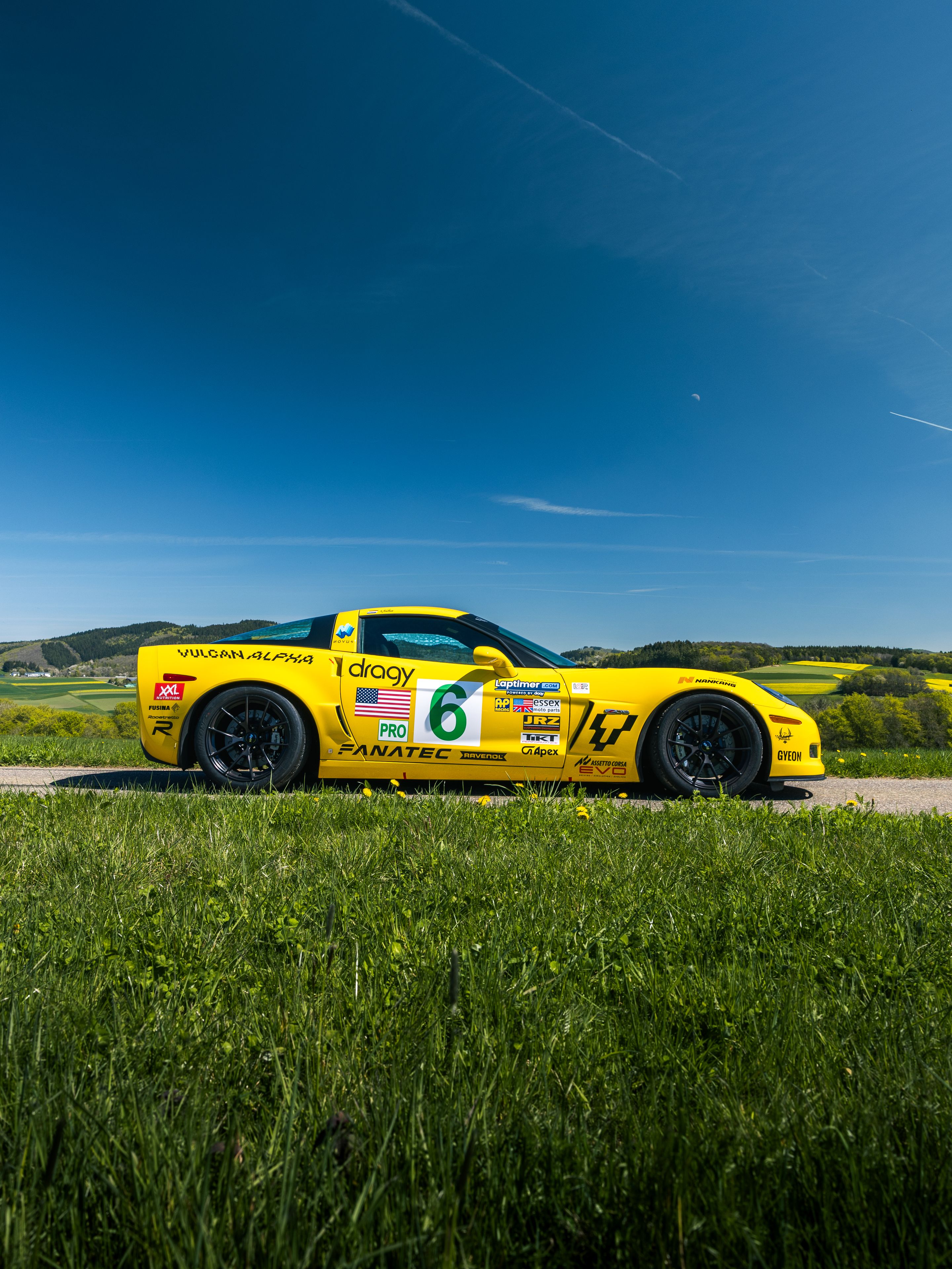Yellow Chevrolet C6 Corvette Z06 with 18" VS-5RS Apex wheels in Satin Black