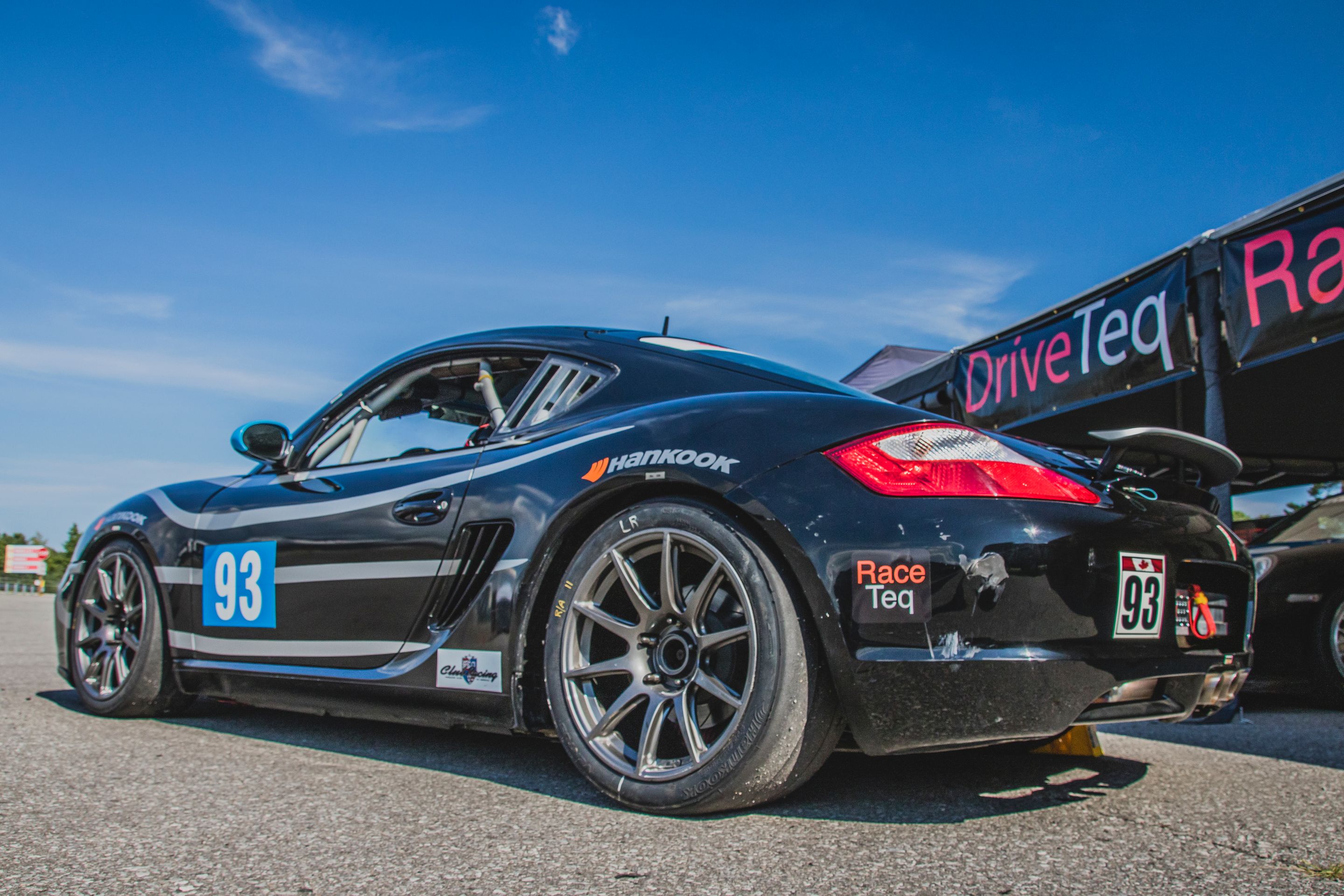 Black Porsche 987 Spec Cayman (SPC) with 18" SM-10 Apex wheels in Anthracite