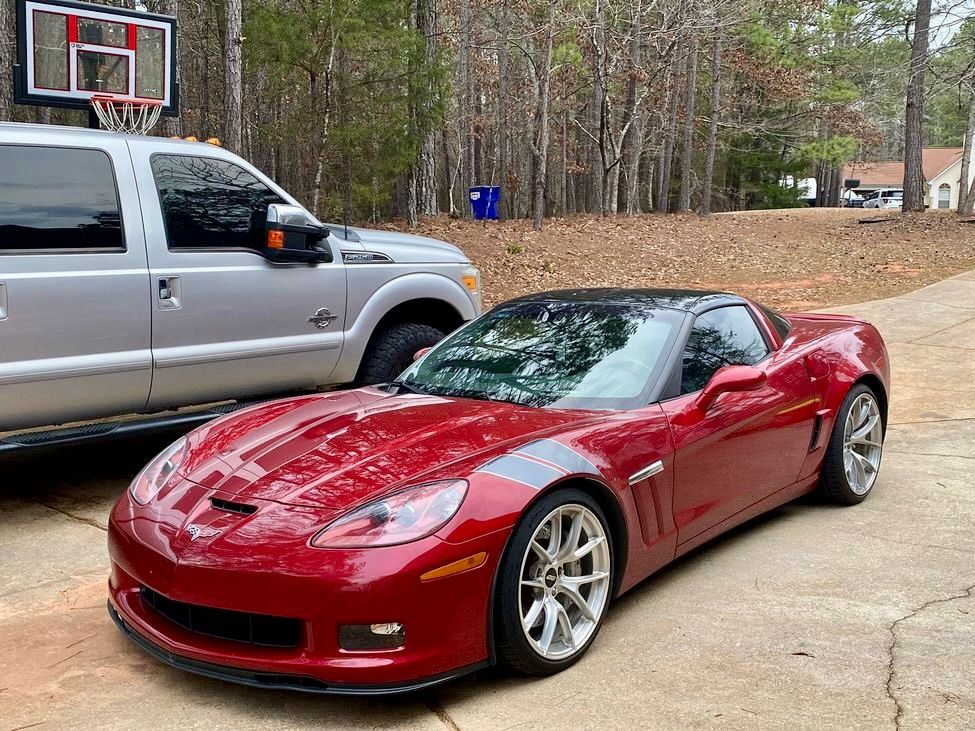 Red Chevrolet C6 Corvette Grand Sport with 19"/20" VS-5RS Apex wheels in Brushed Clear