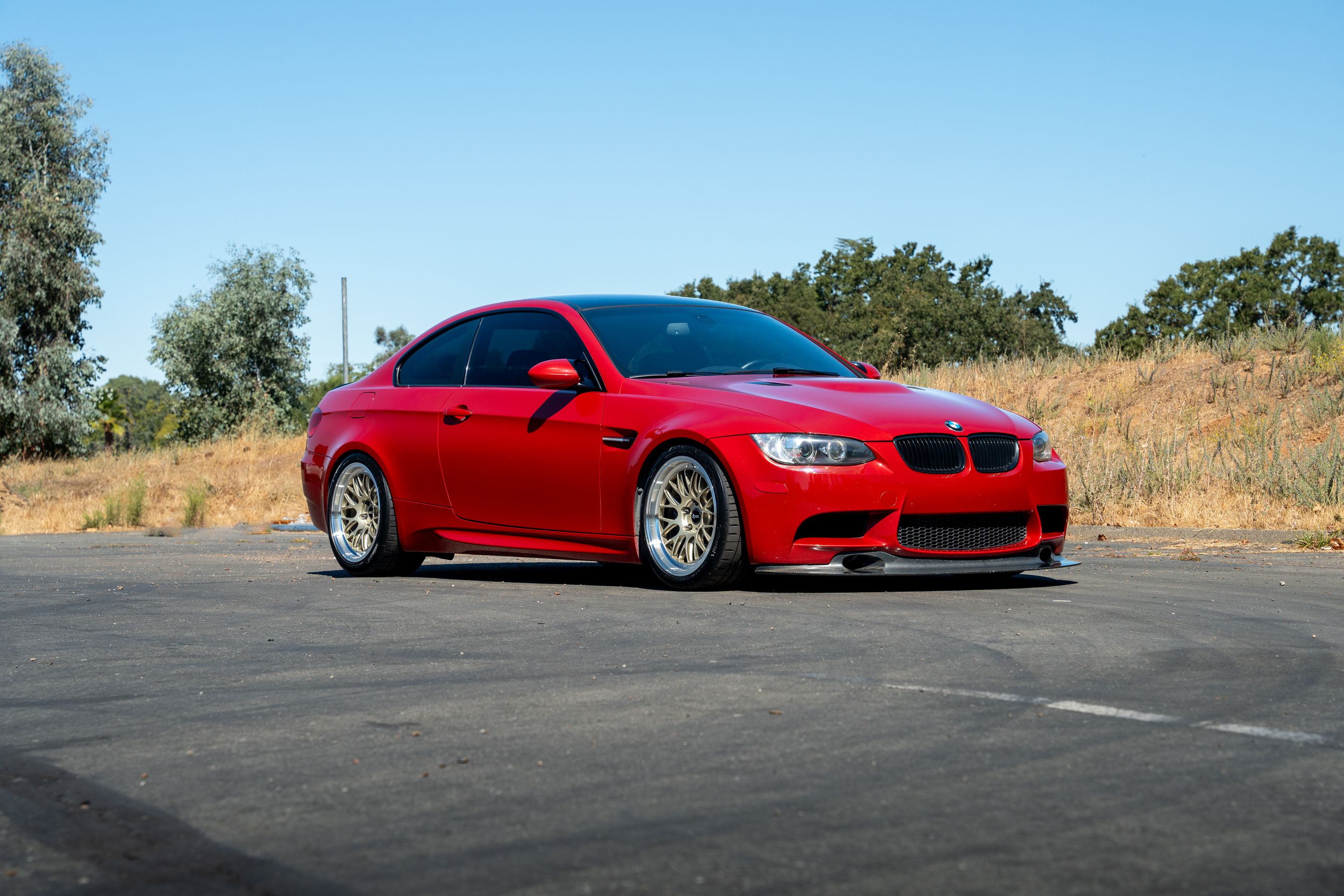 Red BMW E92 Coupe M3 with 18" ML-10RT Apex wheels in Machined Lip Gloss Motorsport Gold