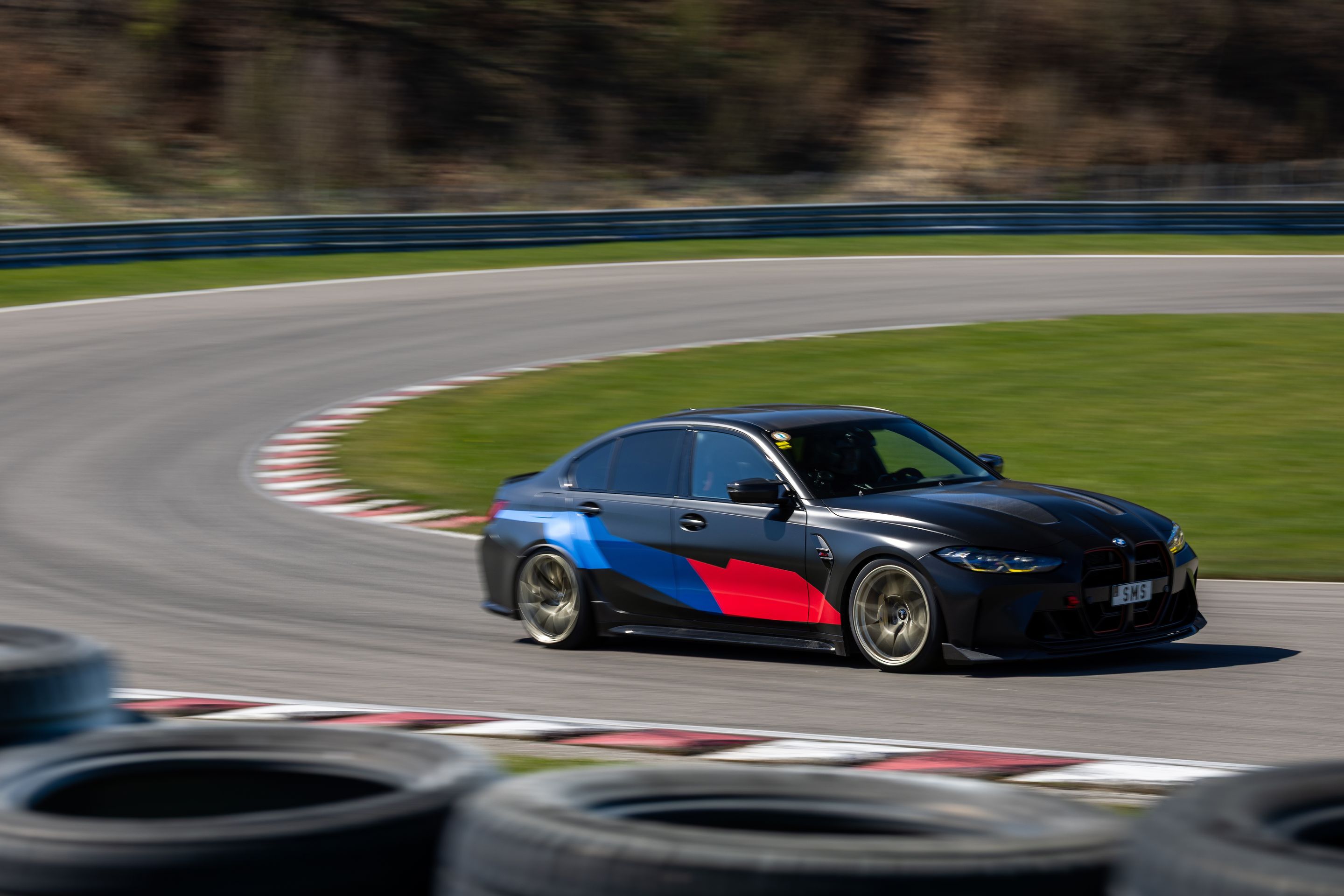 Black BMW G80 M3 with 19" VS-5RS Apex wheels in Motorsport Gold