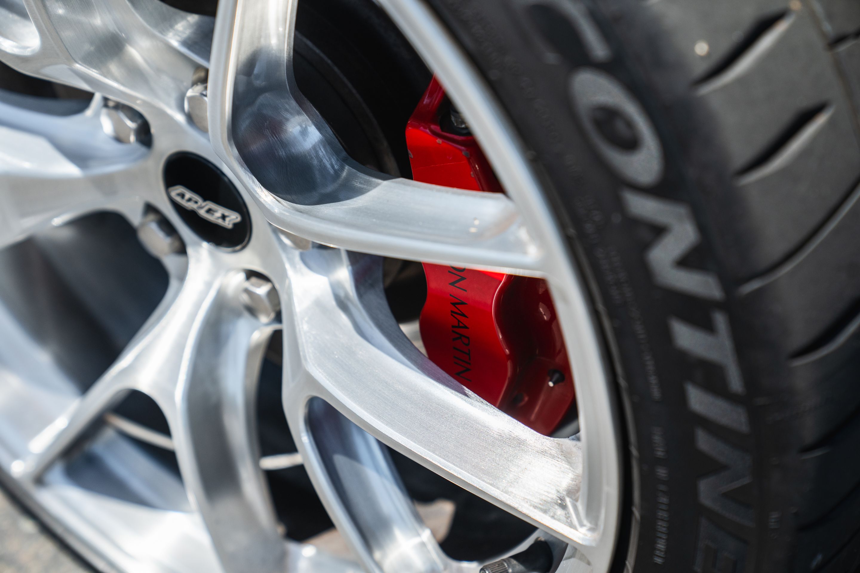 Black Aston Martin V8/V12 Vantage with 19" VS-5RS Apex wheels in Brushed Clear