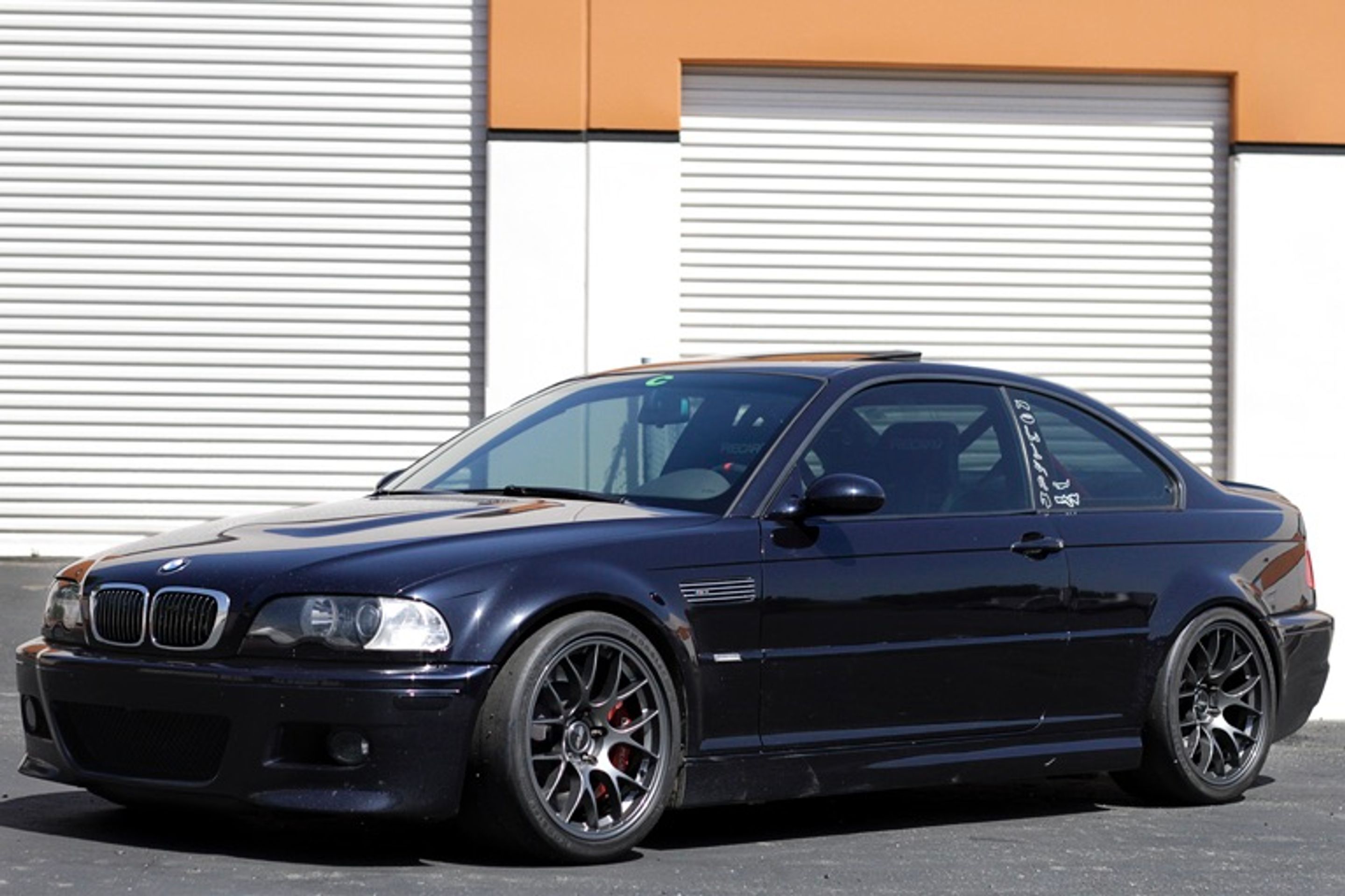 Black BMW E46 M3 with 18" EC-7 Apex wheels in Anthracite