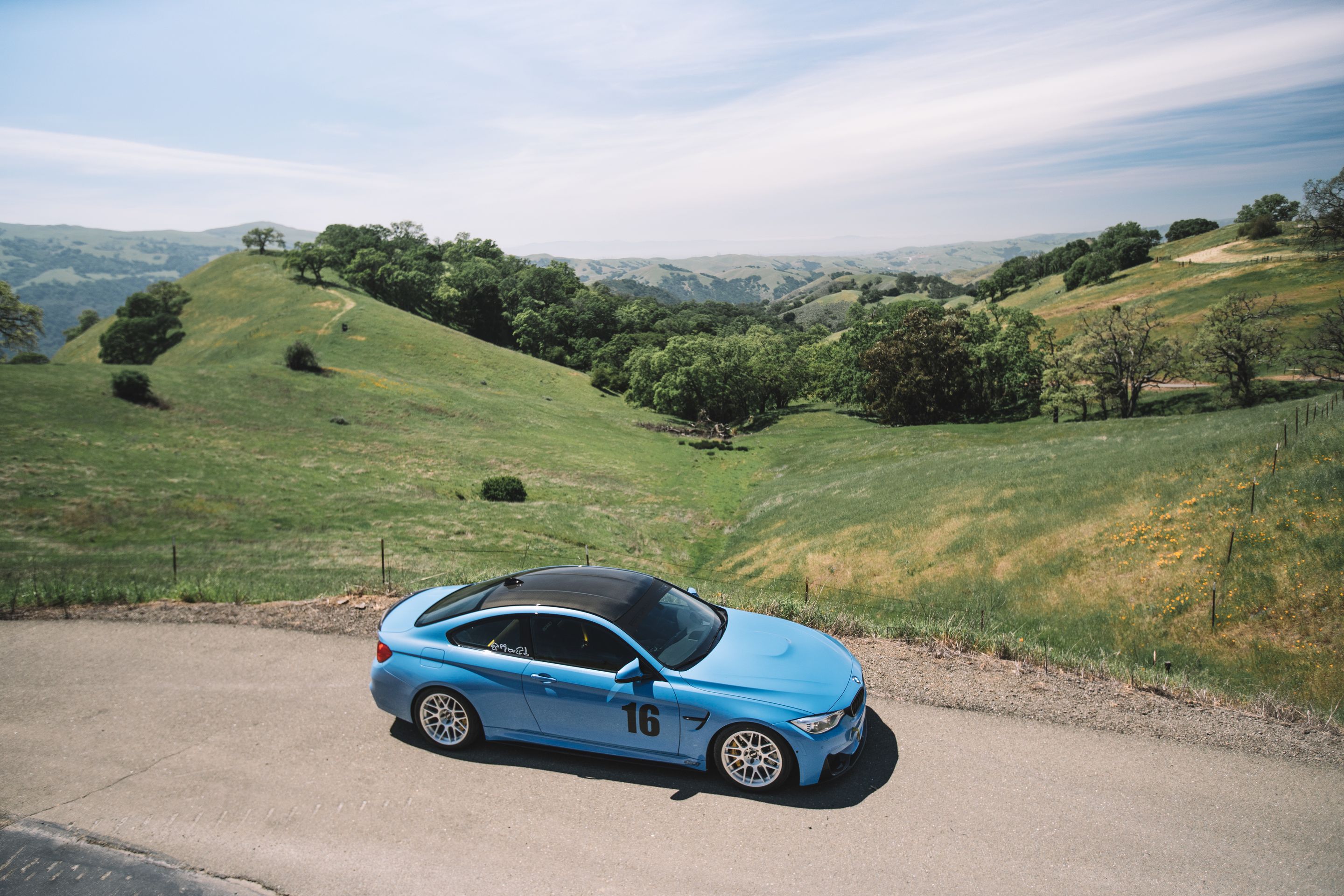 Blue BMW F82 Coupe M4 with 18" ARC-8R Apex wheels in Brushed Clear