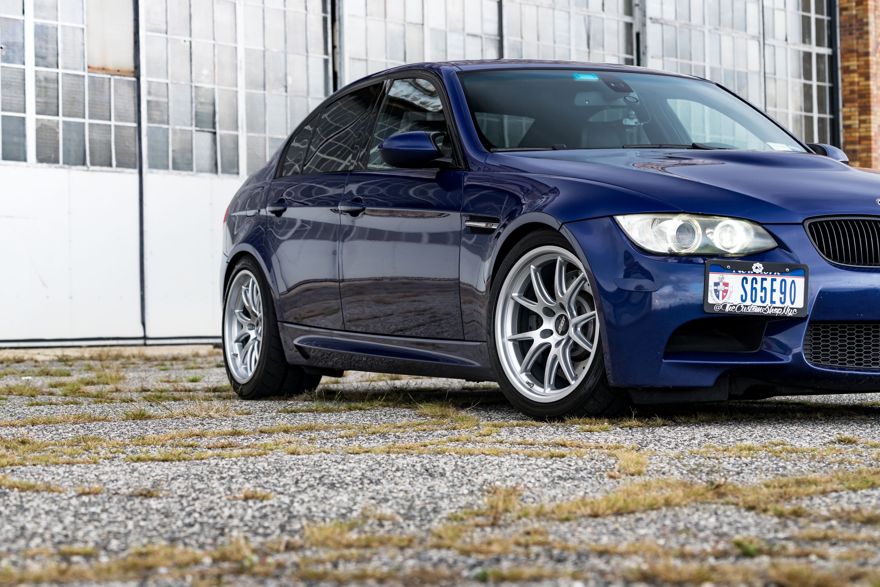 Blue BMW E90 Sedan M3 with 18" FL-5 Apex wheels in Race Silver