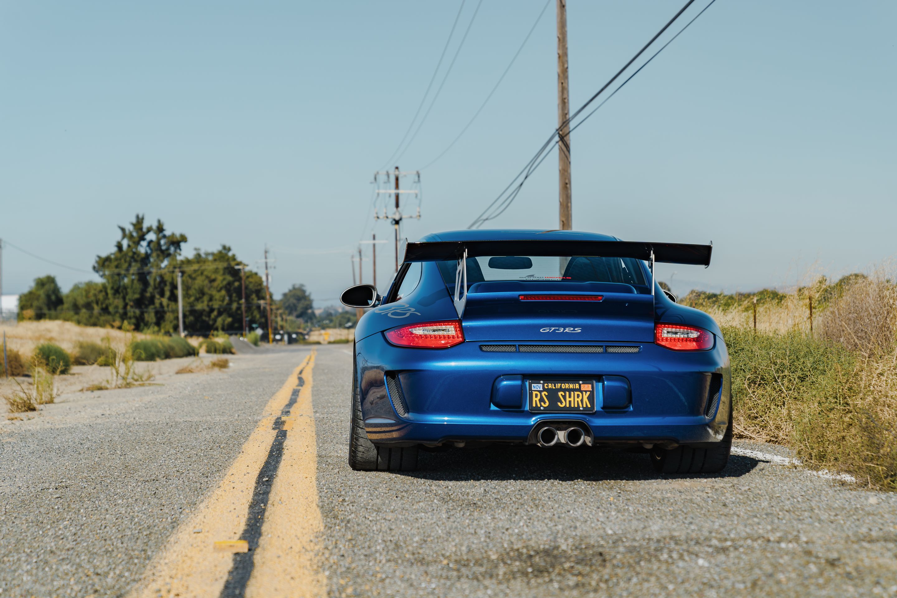 Blue Porsche 911 997 GT3 RS with 19" VS-5RS Apex wheels in Motorsport Gold