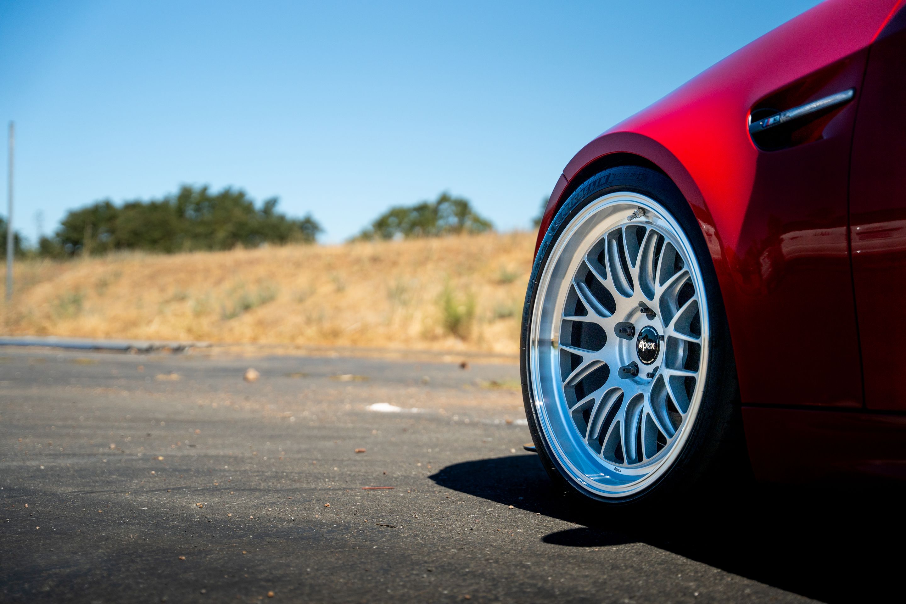 Red BMW E92 Coupe M3 with 19" ML-10RT Apex wheels in Machined Lip Race Silver
