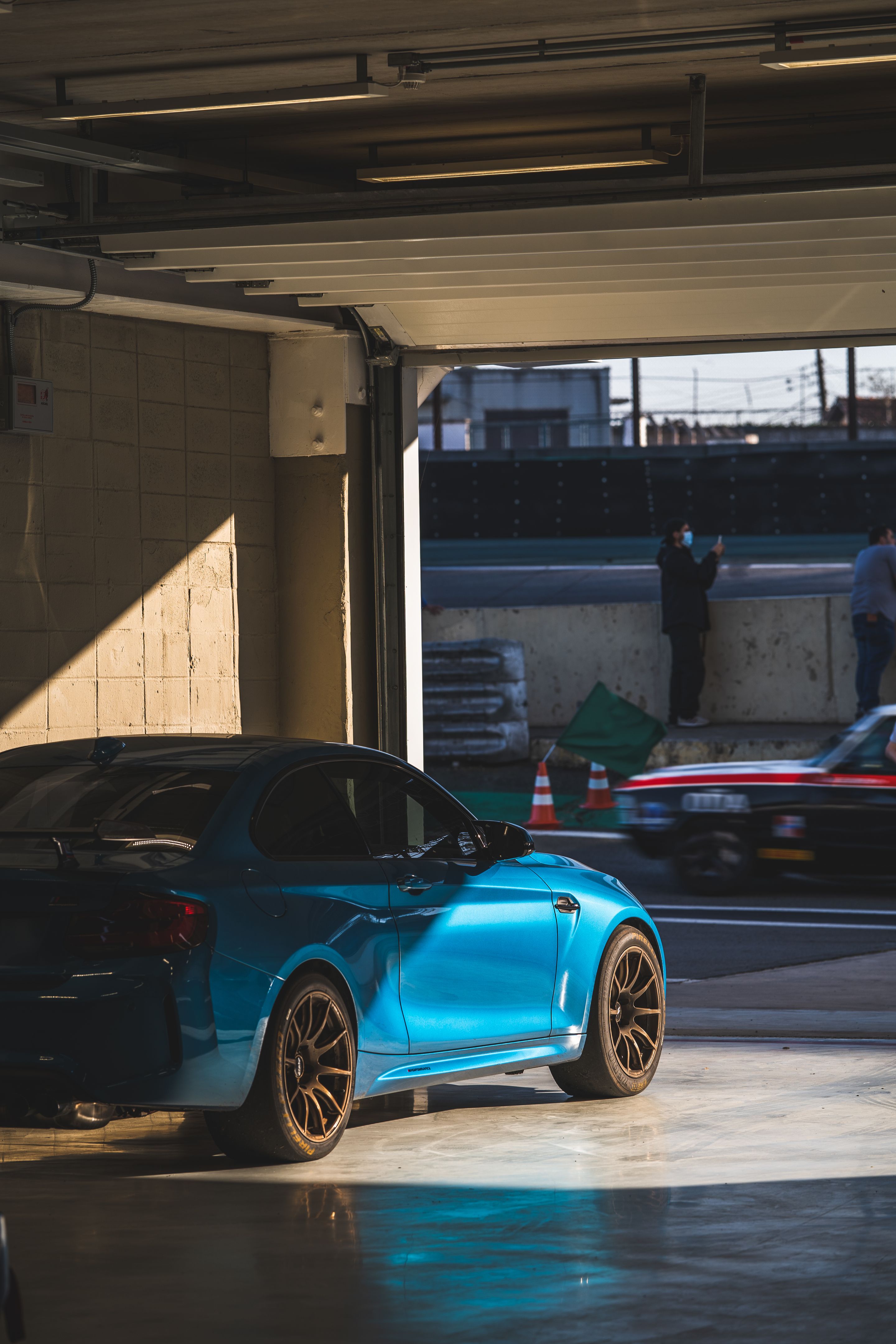 Blue BMW F87 M2 with 18" SM-10 Apex wheels in Custom Finish