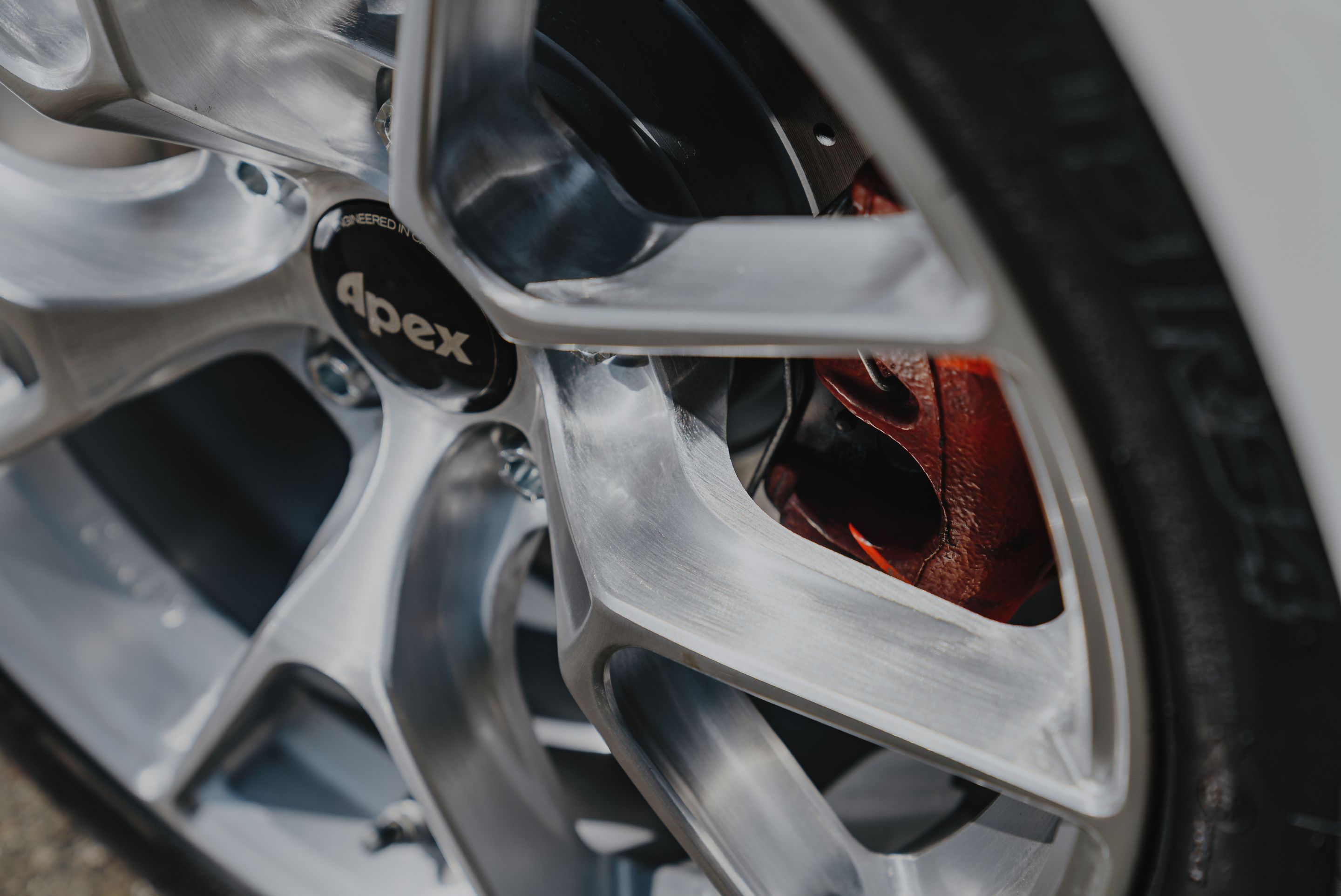 White VW MK6 GTI with 17" VS-5RS Apex wheels in Brushed Clear