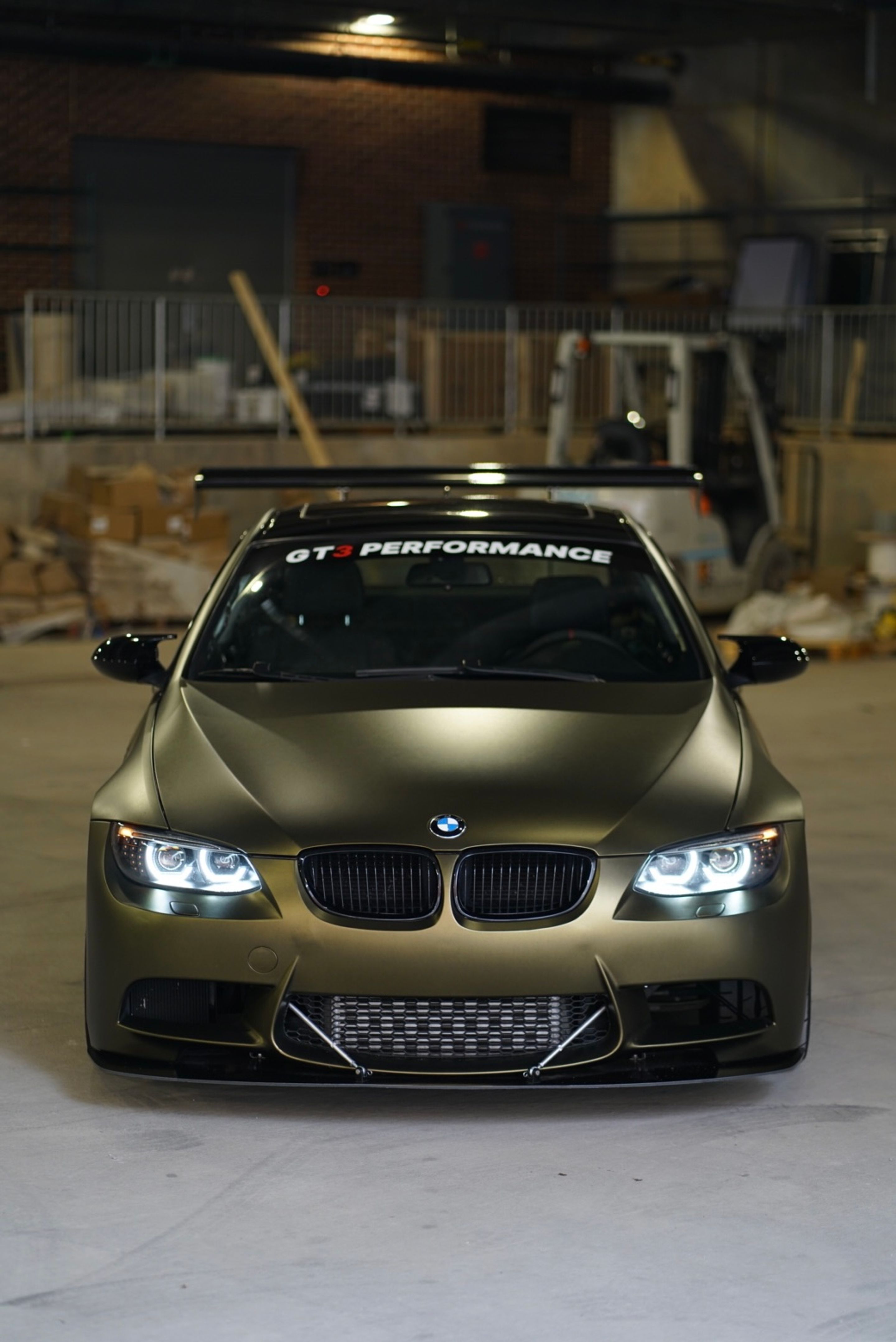 Brown BMW E92 Coupe 3 Series with 18" EC-7 Apex wheels in Race Silver