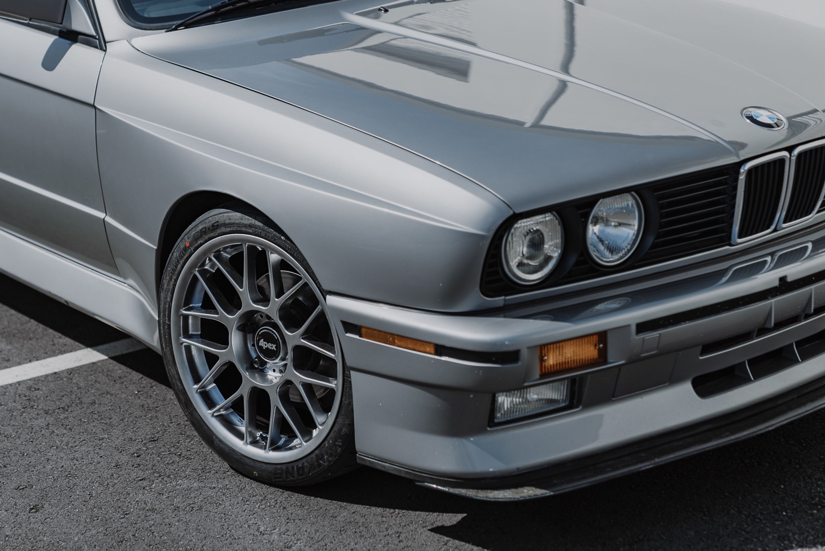 Silver BMW E30 M3 with 17" ARC-8 Apex wheels in Hyper Black