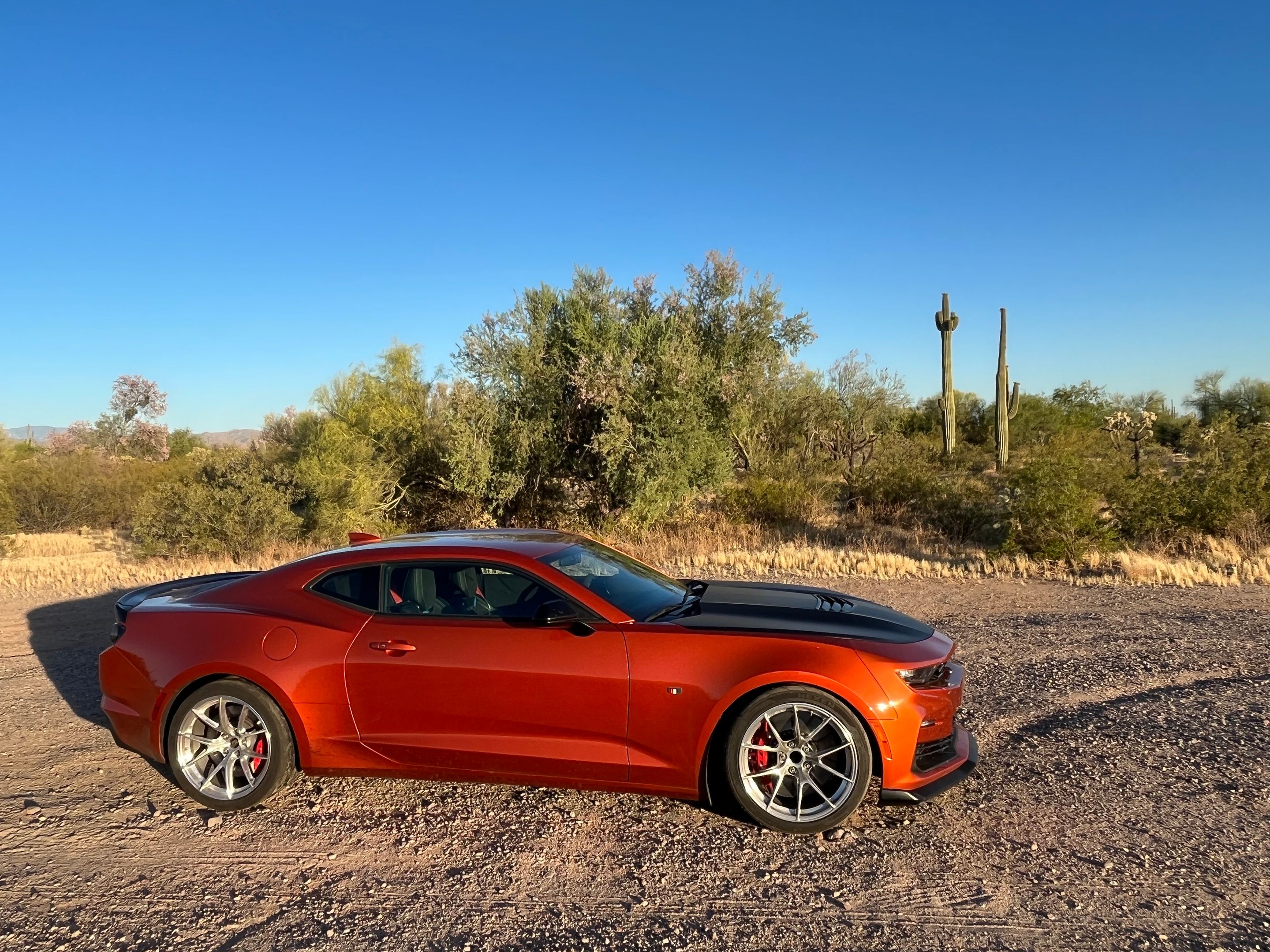 Orange Chevrolet 6th Gen Camaro SS 1LE with 19" VS-5RS Apex wheels in Brushed Clear