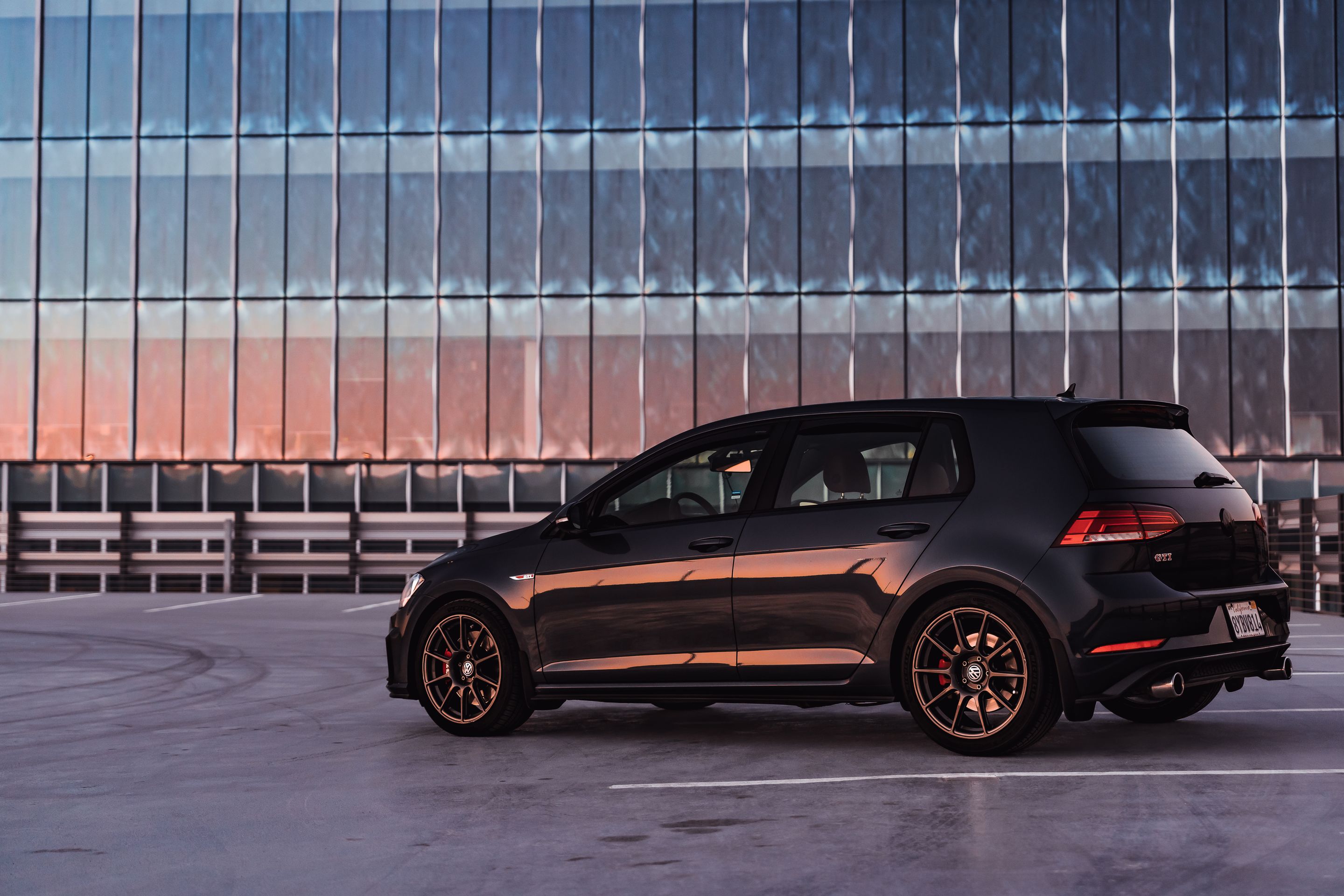 Black VW MK7 GTI with 17" SM-10 Apex wheels in Anthracite