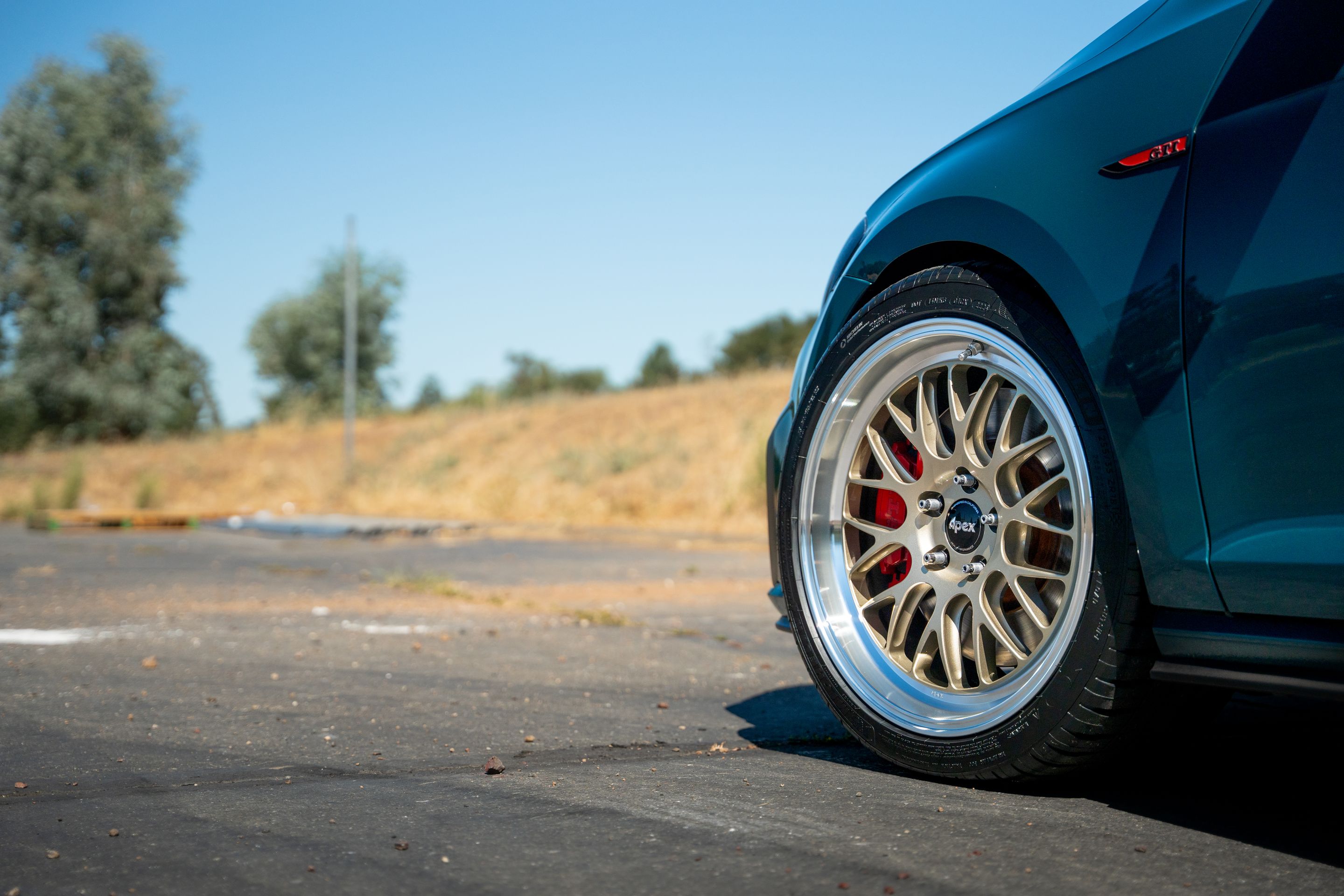 Green VW MK7 GTI with 18" ML-10RT Apex wheels in Machined Lip Gloss Motorsport Gold