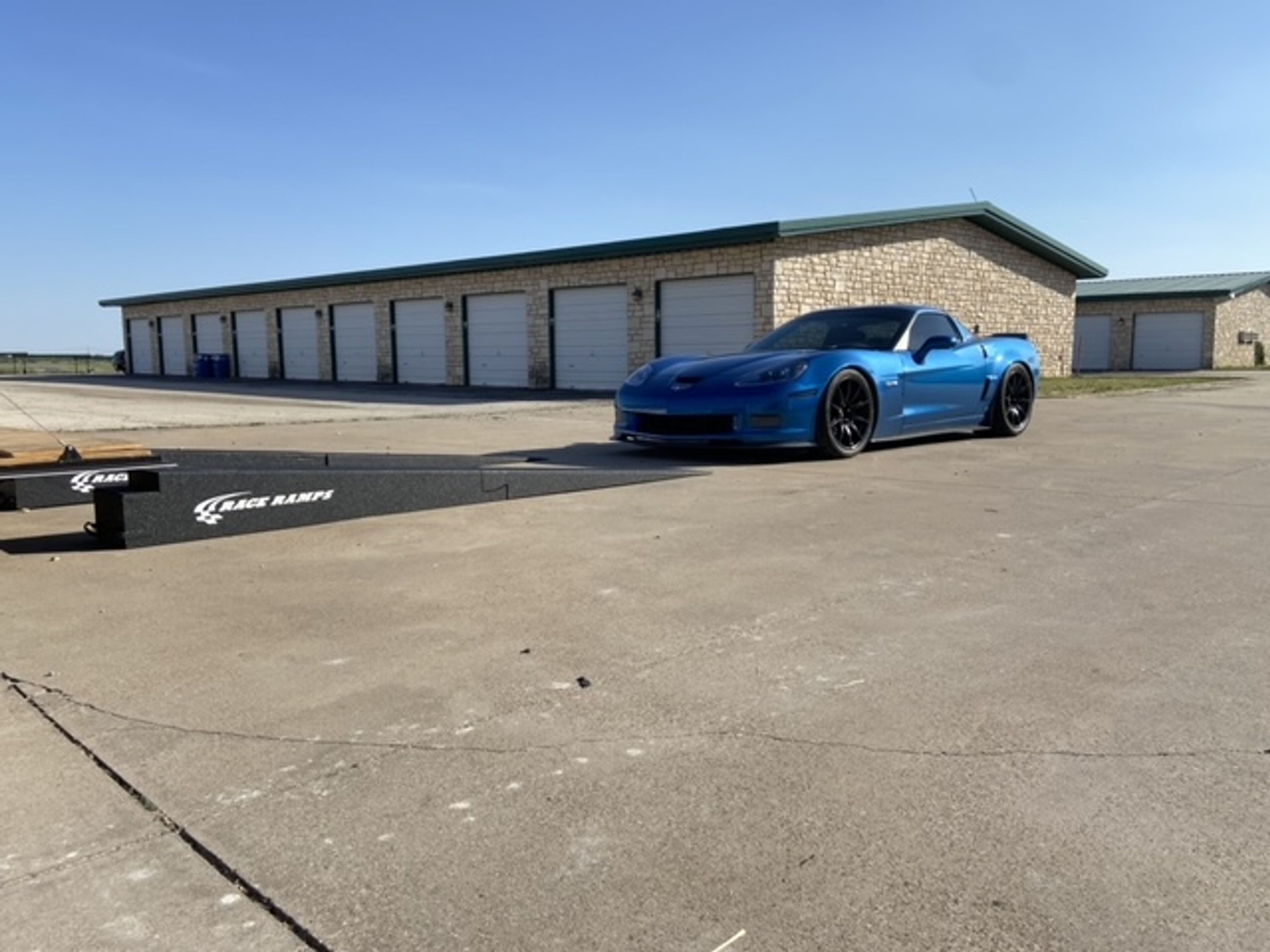 Blue Chevrolet C6 Corvette Z06 with 19" SM-10 Apex wheels in Satin Black