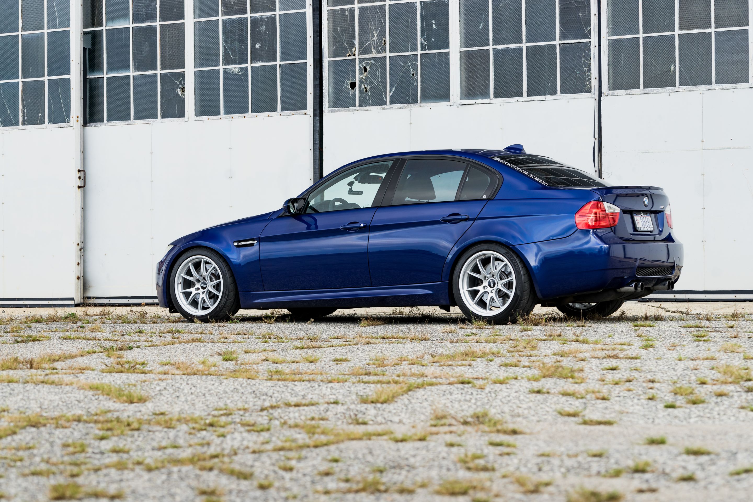 Blue BMW E90 Sedan M3 with 18" FL-5 Apex wheels in Race Silver