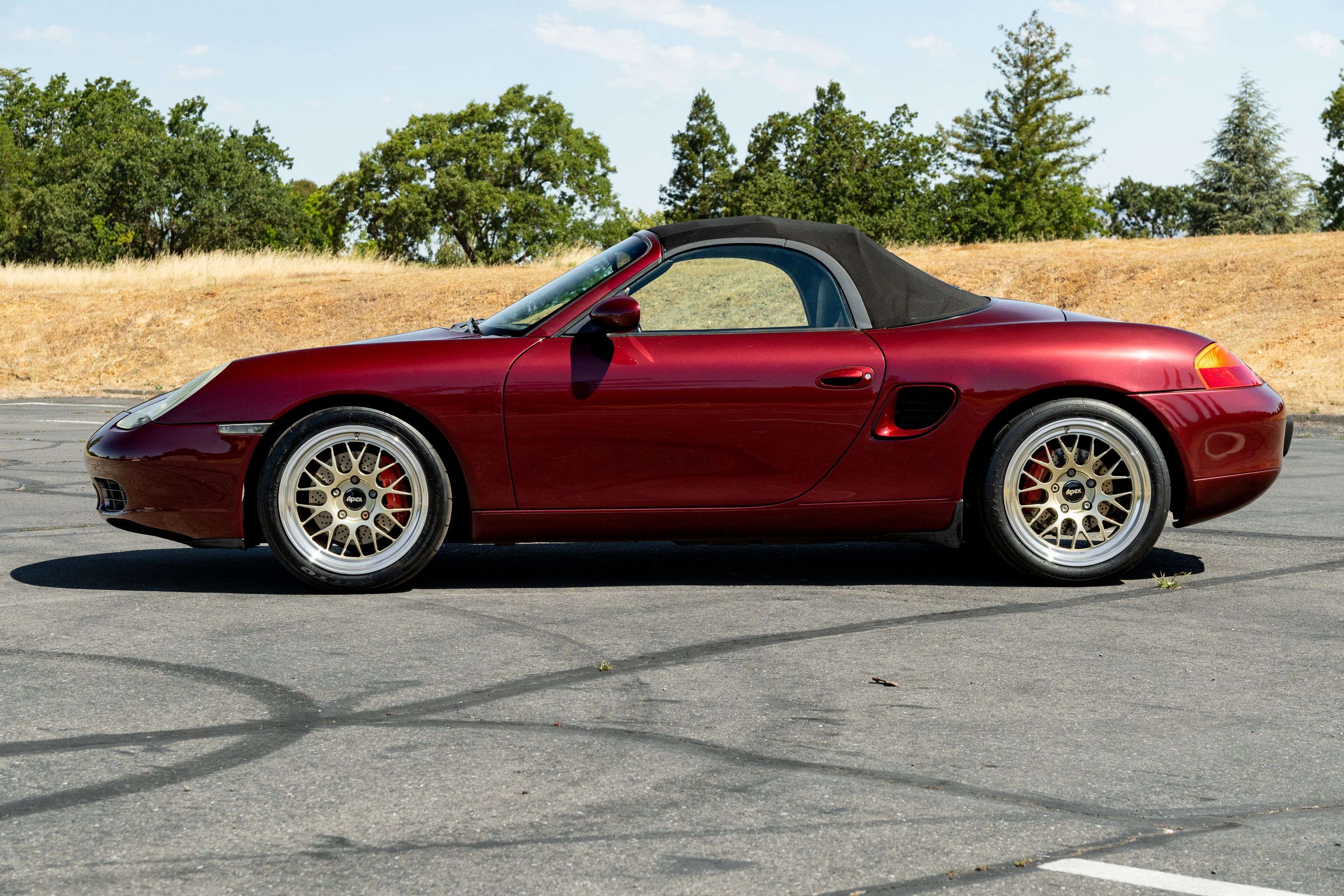 Red Porsche 986 Boxster with 18" ML-10RT Apex wheels in Machined Lip Gloss Motorsport Gold