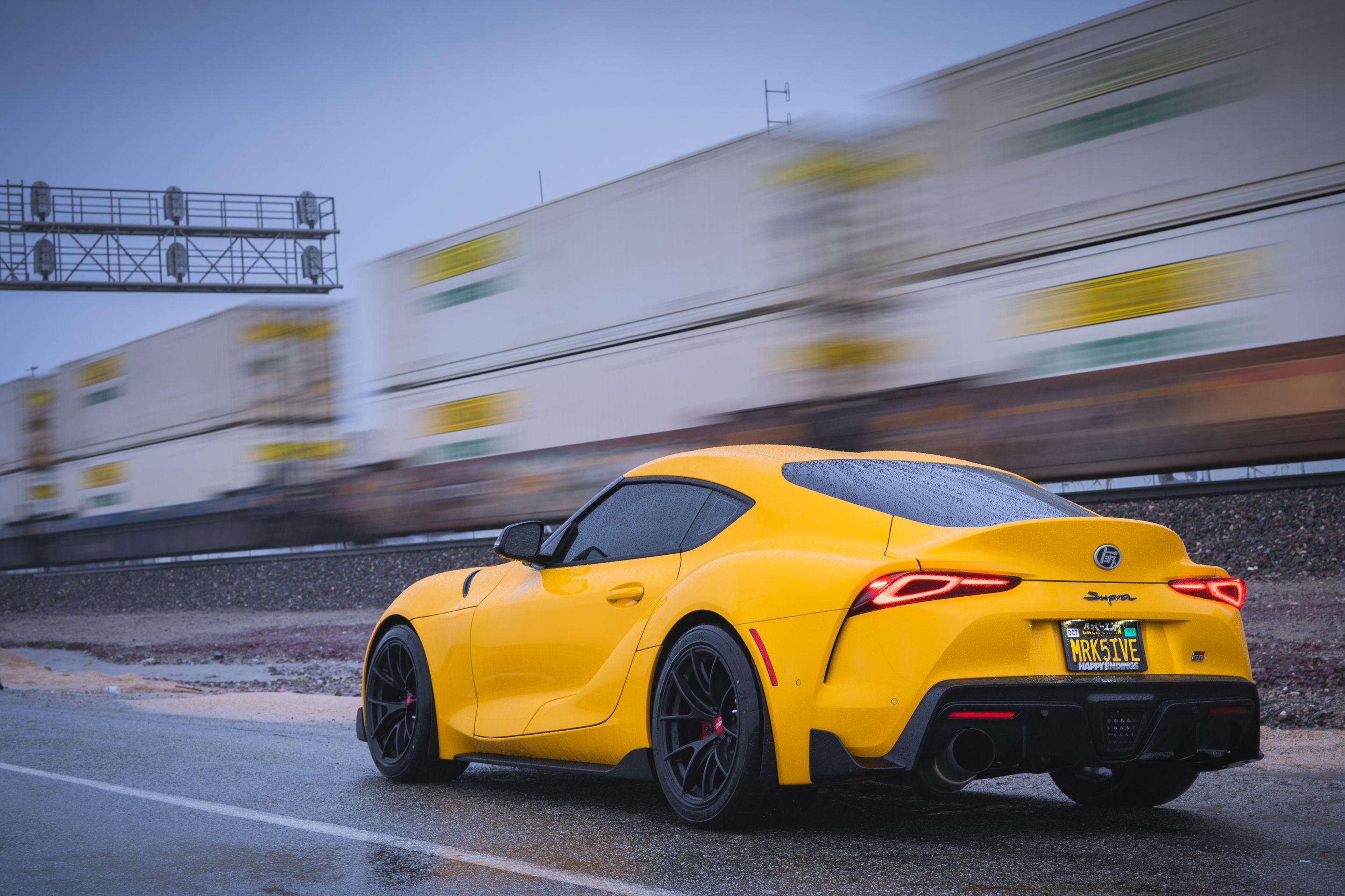 Yellow Toyota GR Supra with 18" VS-5RS Apex wheels in Satin Black