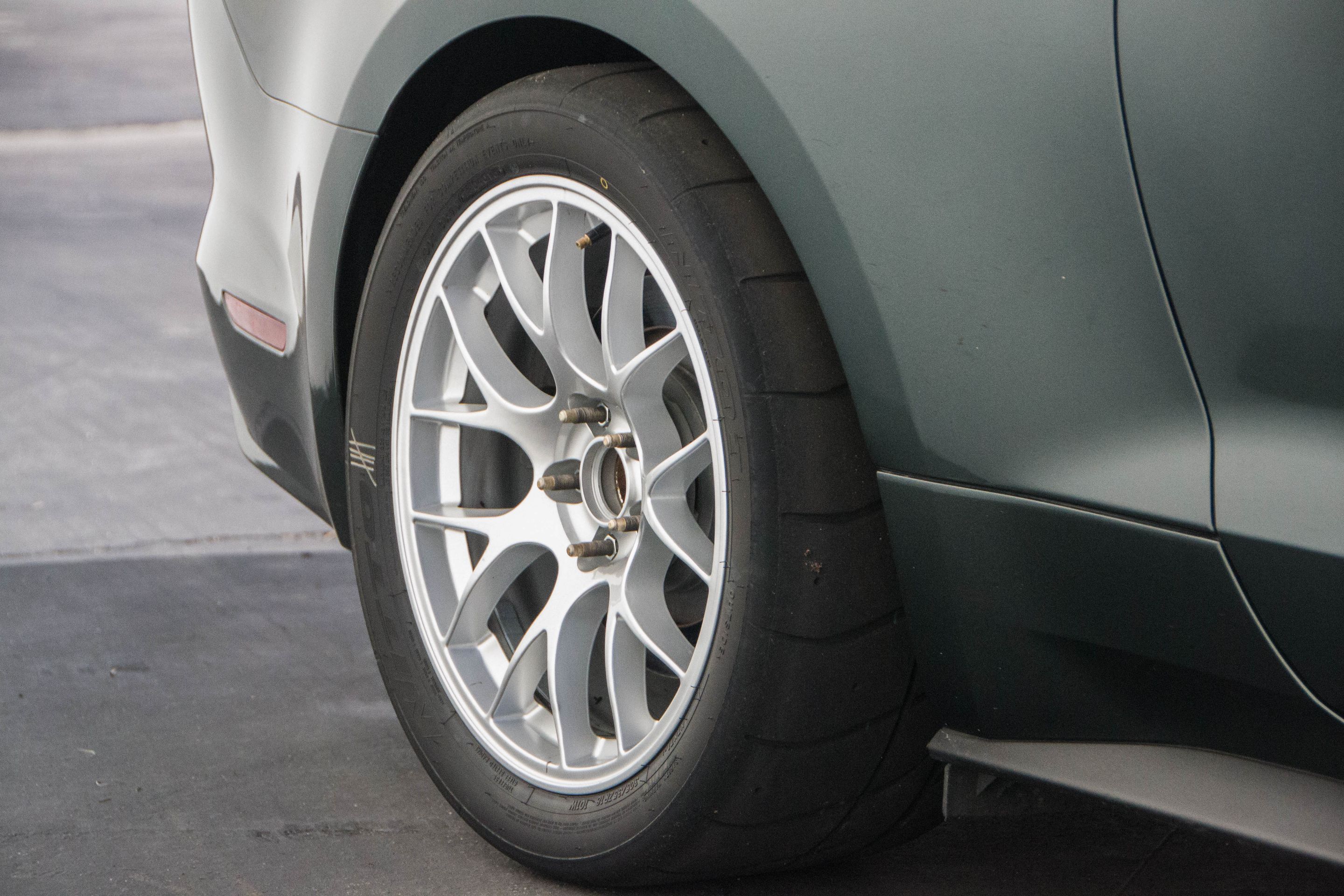 Green Ford S550 Mustang GT with 18" EC-7 Apex wheels in Race Silver