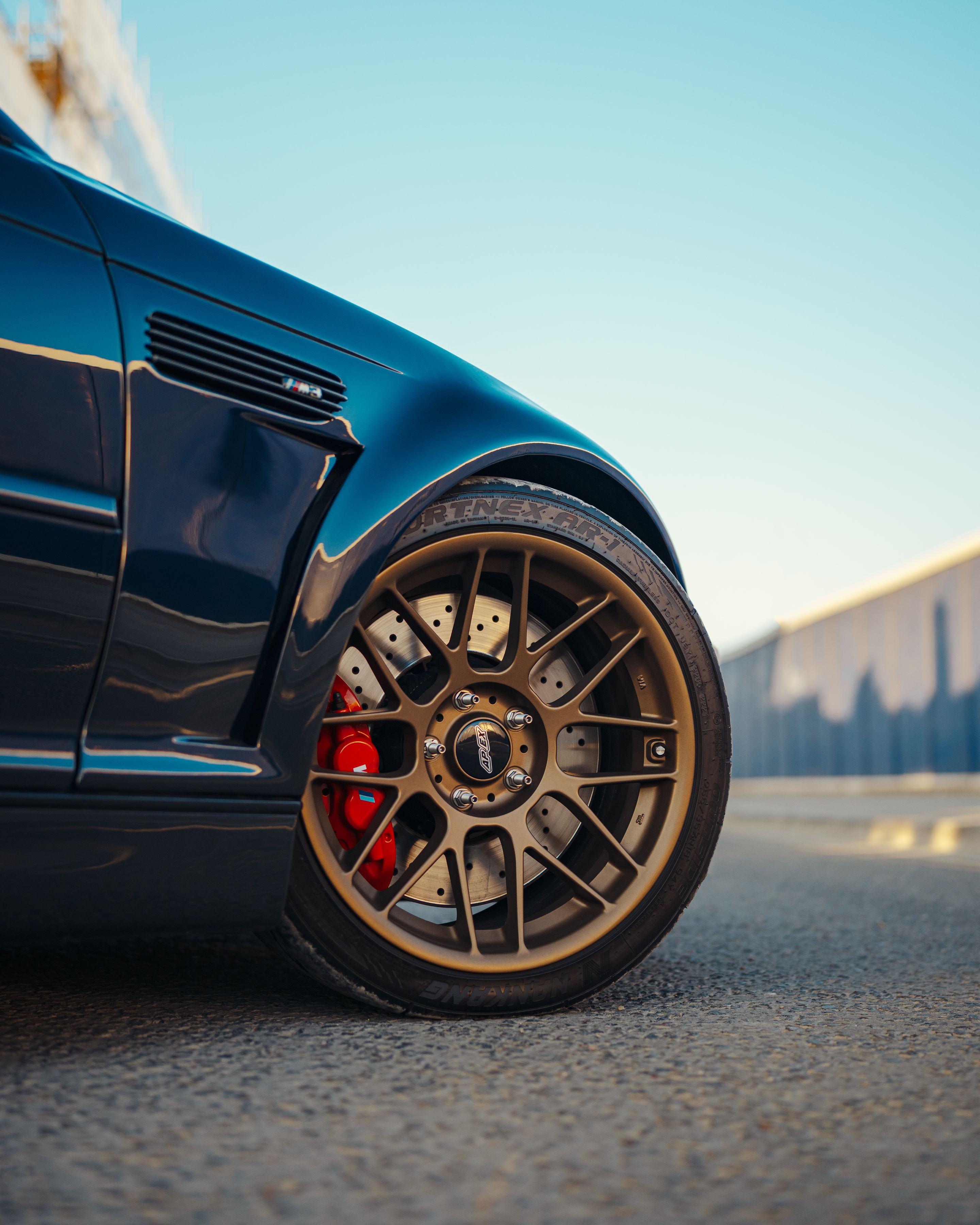 Black BMW E46 M3 with 18" ARC-8 Apex wheels in Satin Bronze