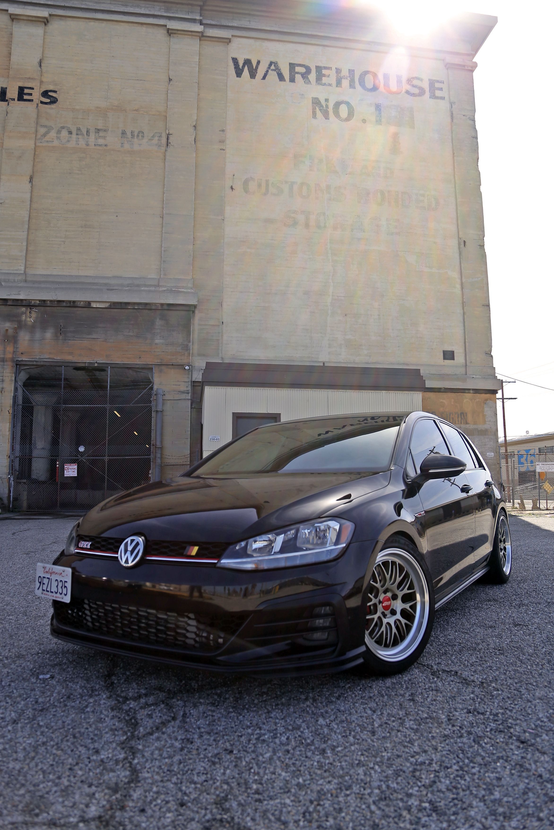 Black VW MK7 GTI with 18" ML-10RT Apex wheels in Machined Lip Gloss Motorsport Gold