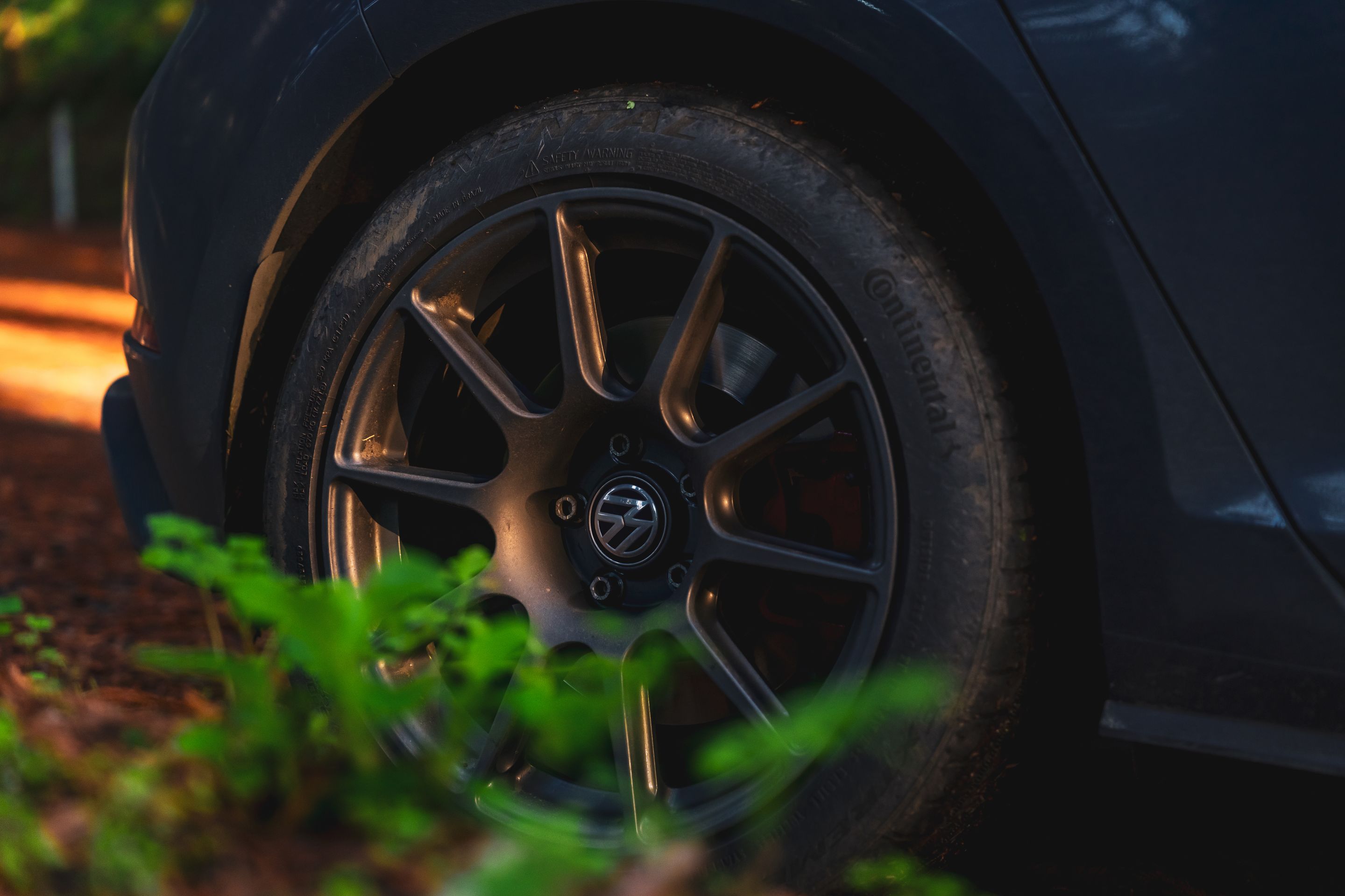 Black VW MK7 GTI with 17" SM-10 Apex wheels in Anthracite