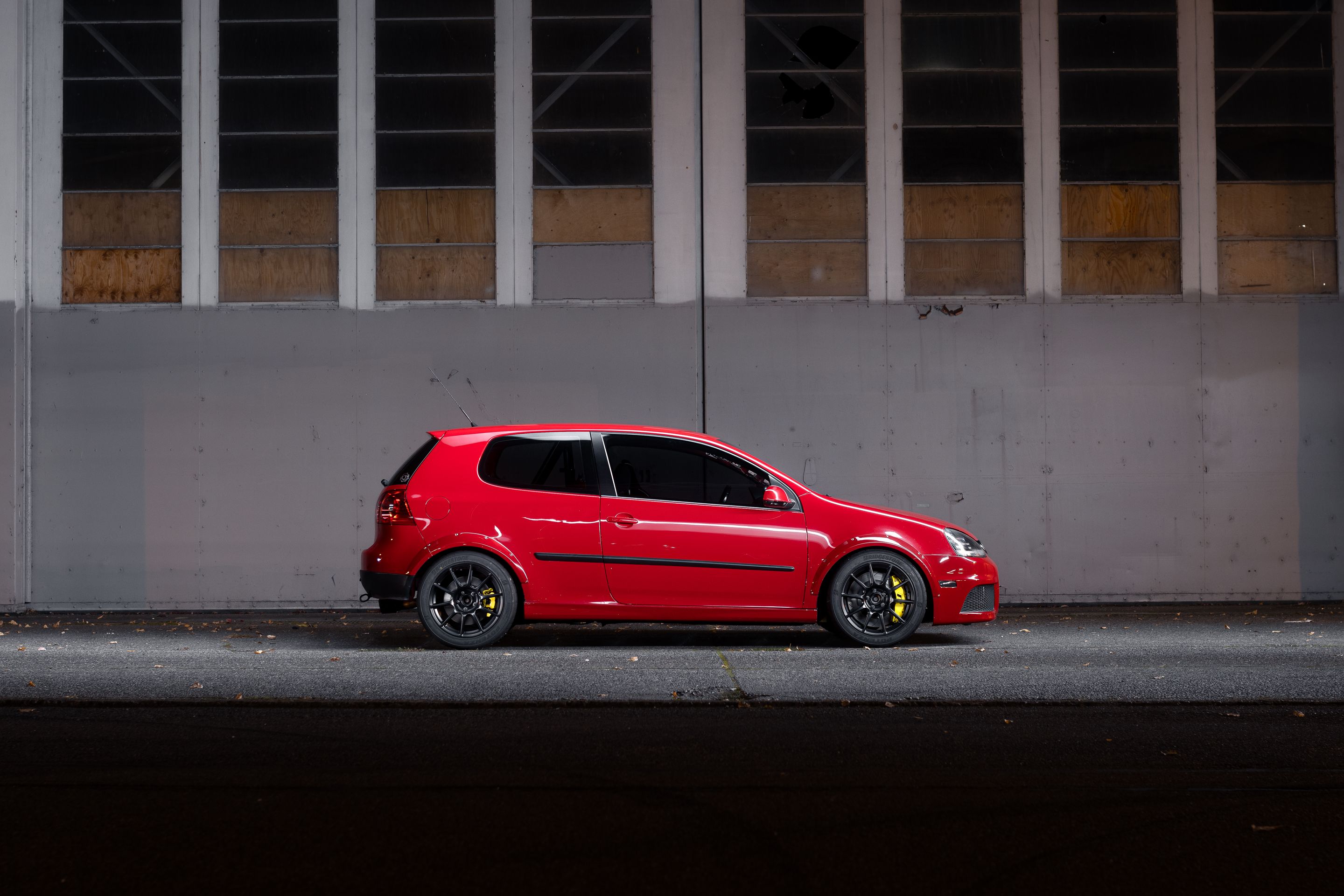 Red VW MK5 Golf with 17" SM-10 Apex wheels in Satin Black