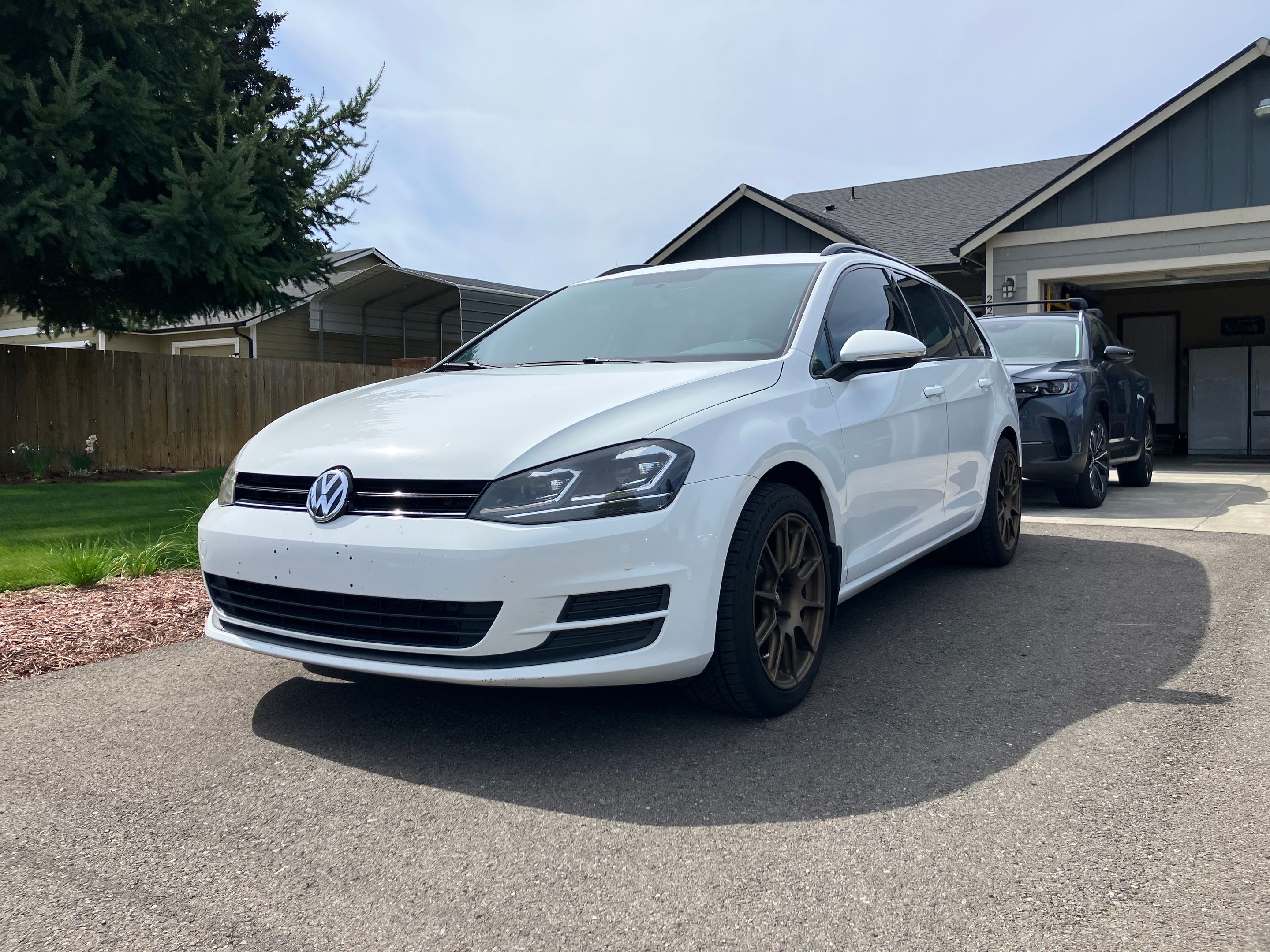 White VW MK7 Alltrack/SportWagen Golf SportWagen with 17" VS-5 Apex wheels in Satin Bronze
