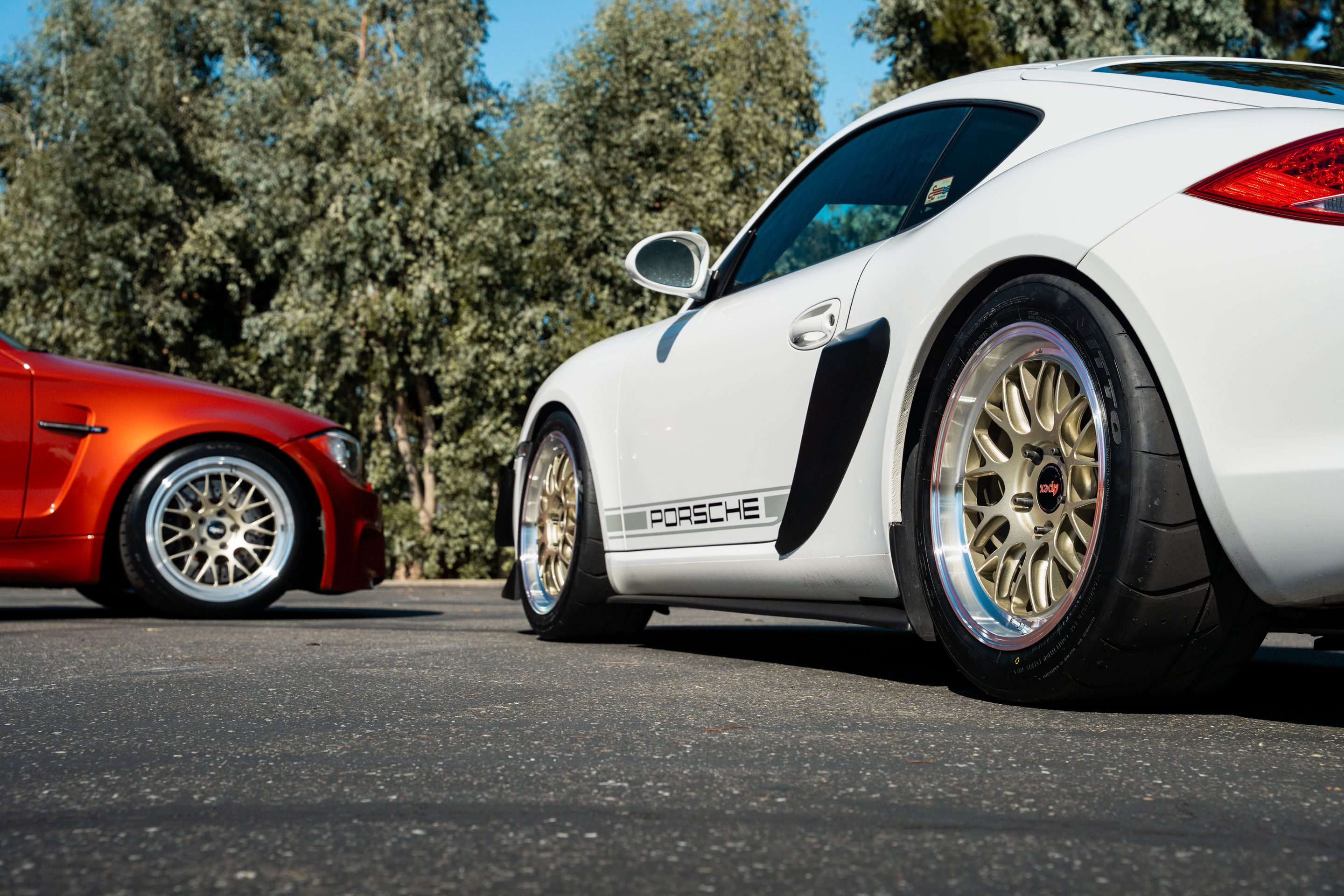 White Porsche 987 Cayman Base with 18" ML-10RT Apex wheels in Machined Lip Gloss Motorsport Gold