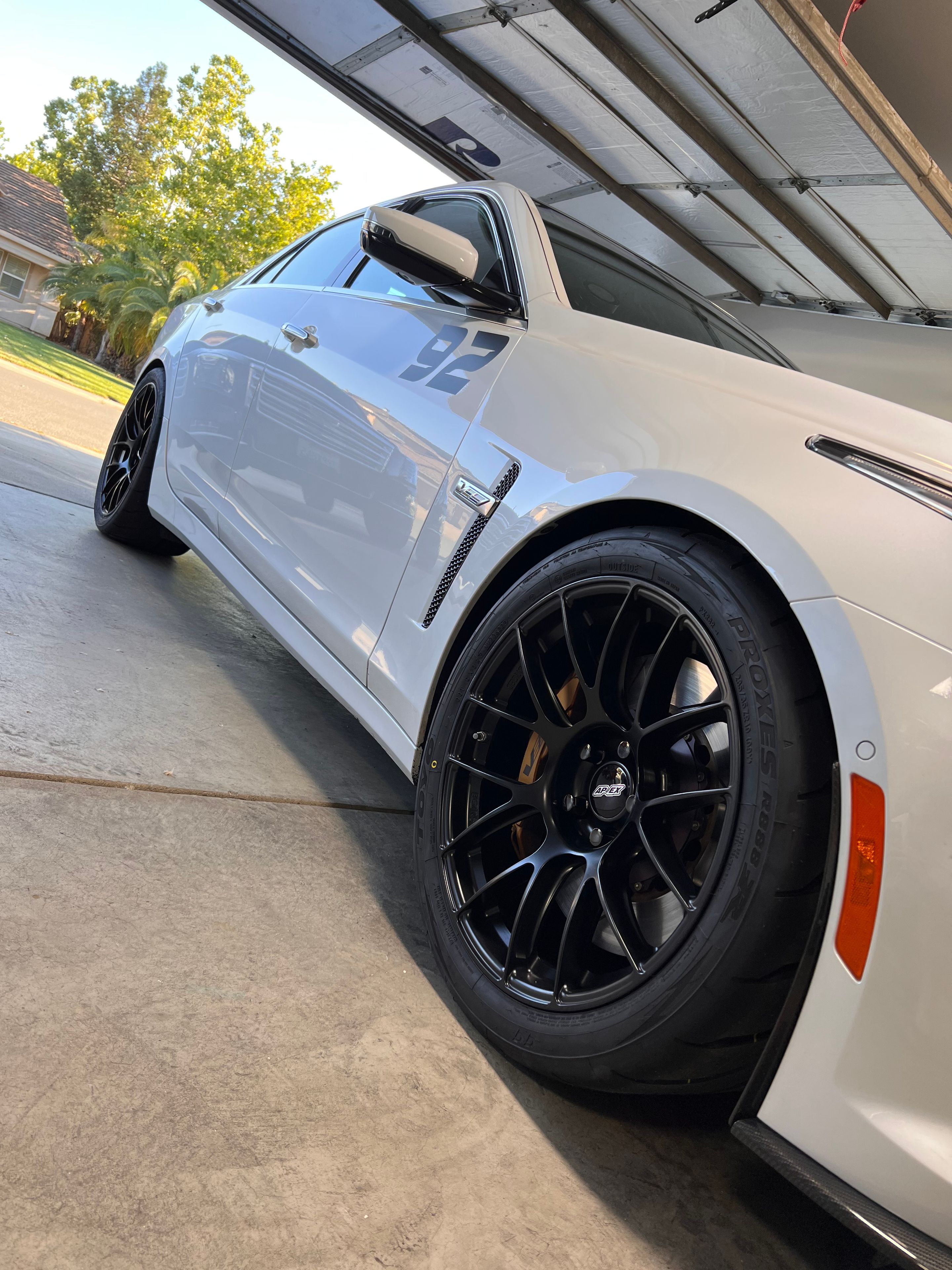 White Cadillac Gen 3 CTS-V with 19" EC-7RS Apex wheels in Satin Black