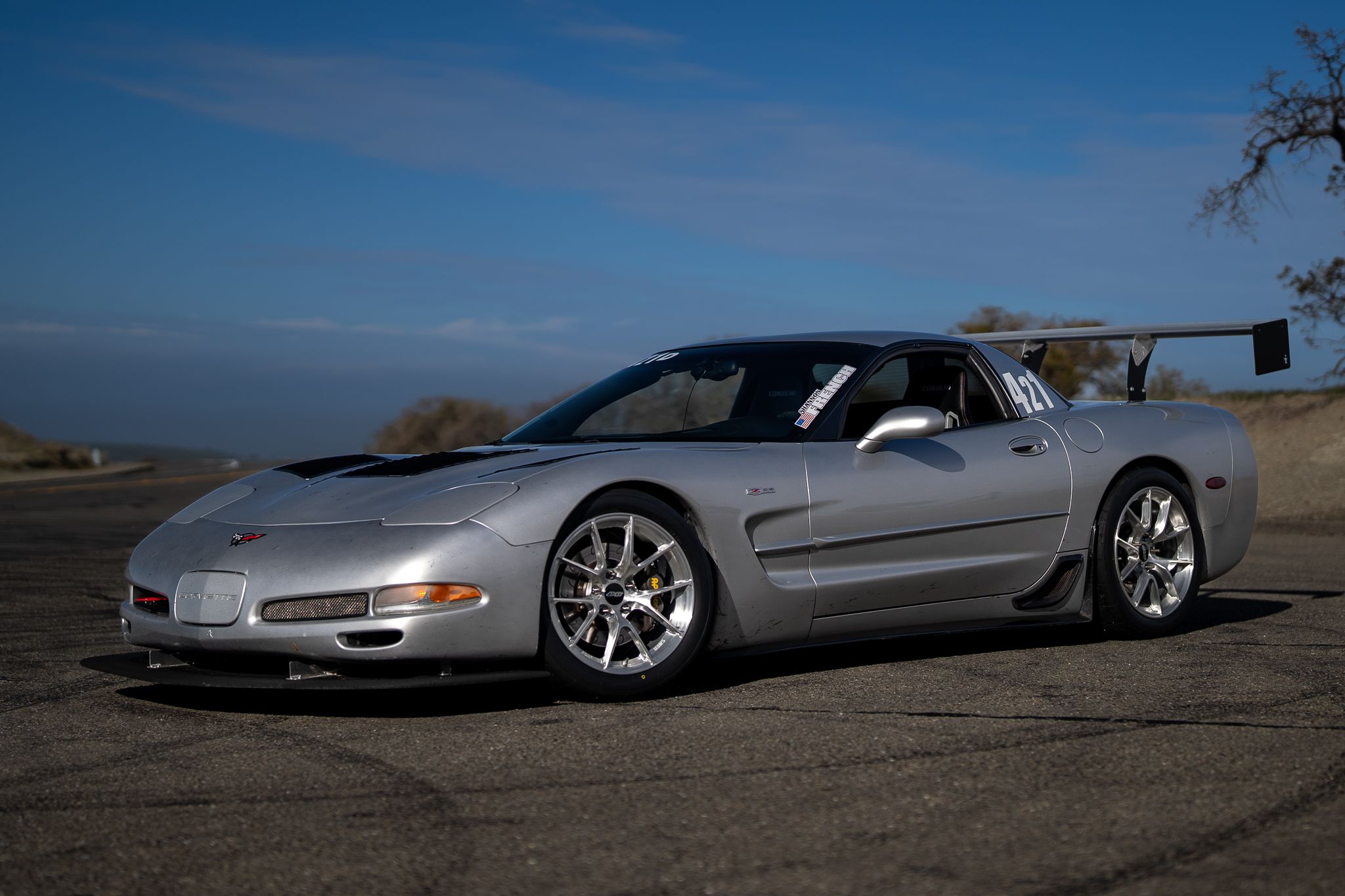 Silver Chevrolet C5 Corvette Z06 with 18" VS-5RS Apex wheels in Brushed Clear