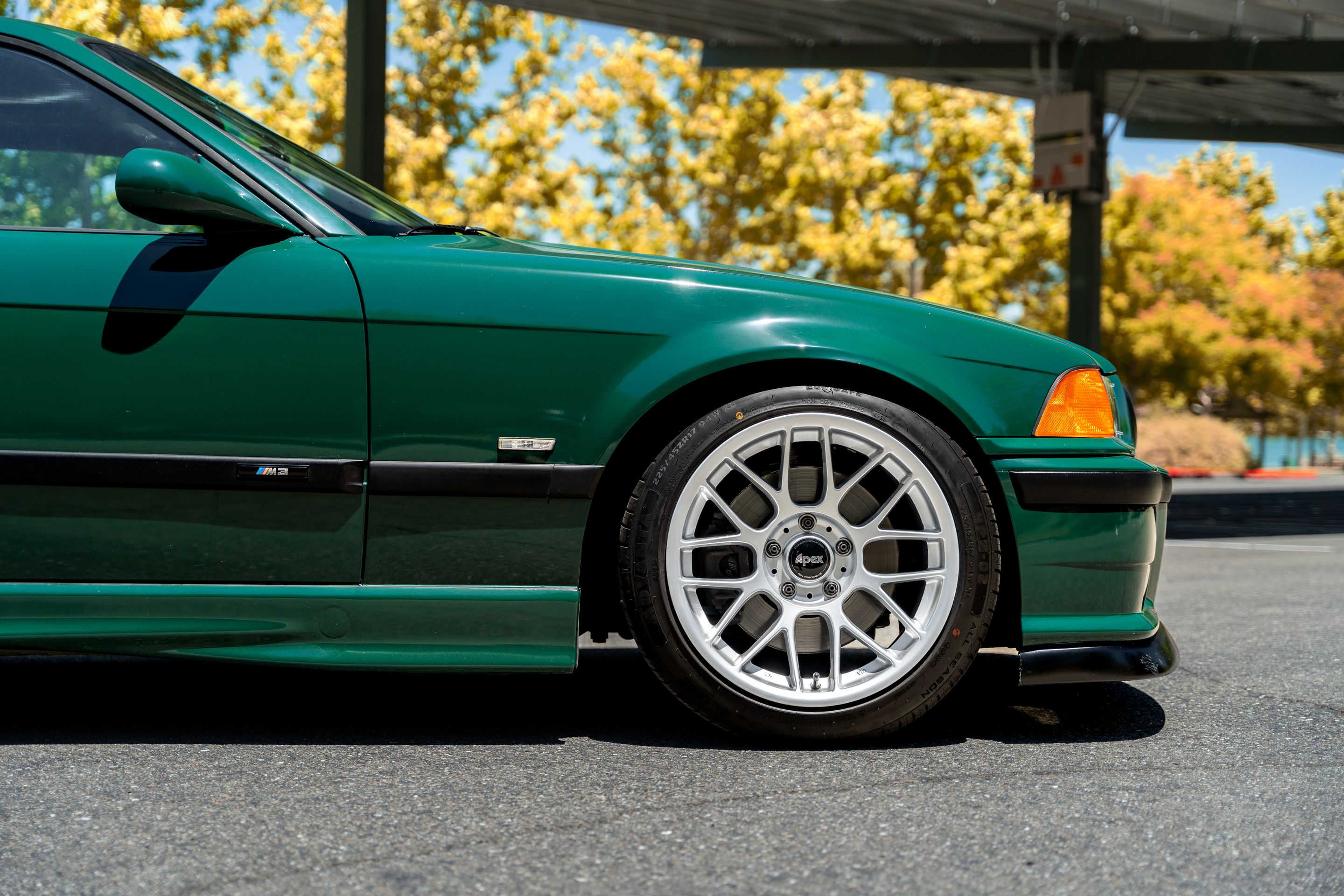 Green BMW E36 M3 with 17" ARC-8 Apex wheels in Race Silver