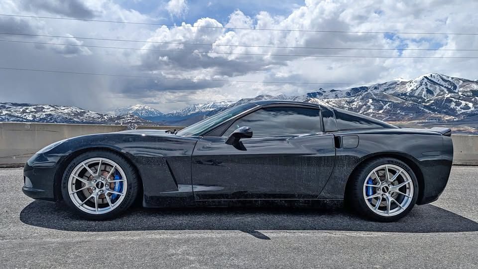 Black Chevrolet C6 Corvette Base/Z51 with 18" VS-5RS Apex wheels in Brushed Clear