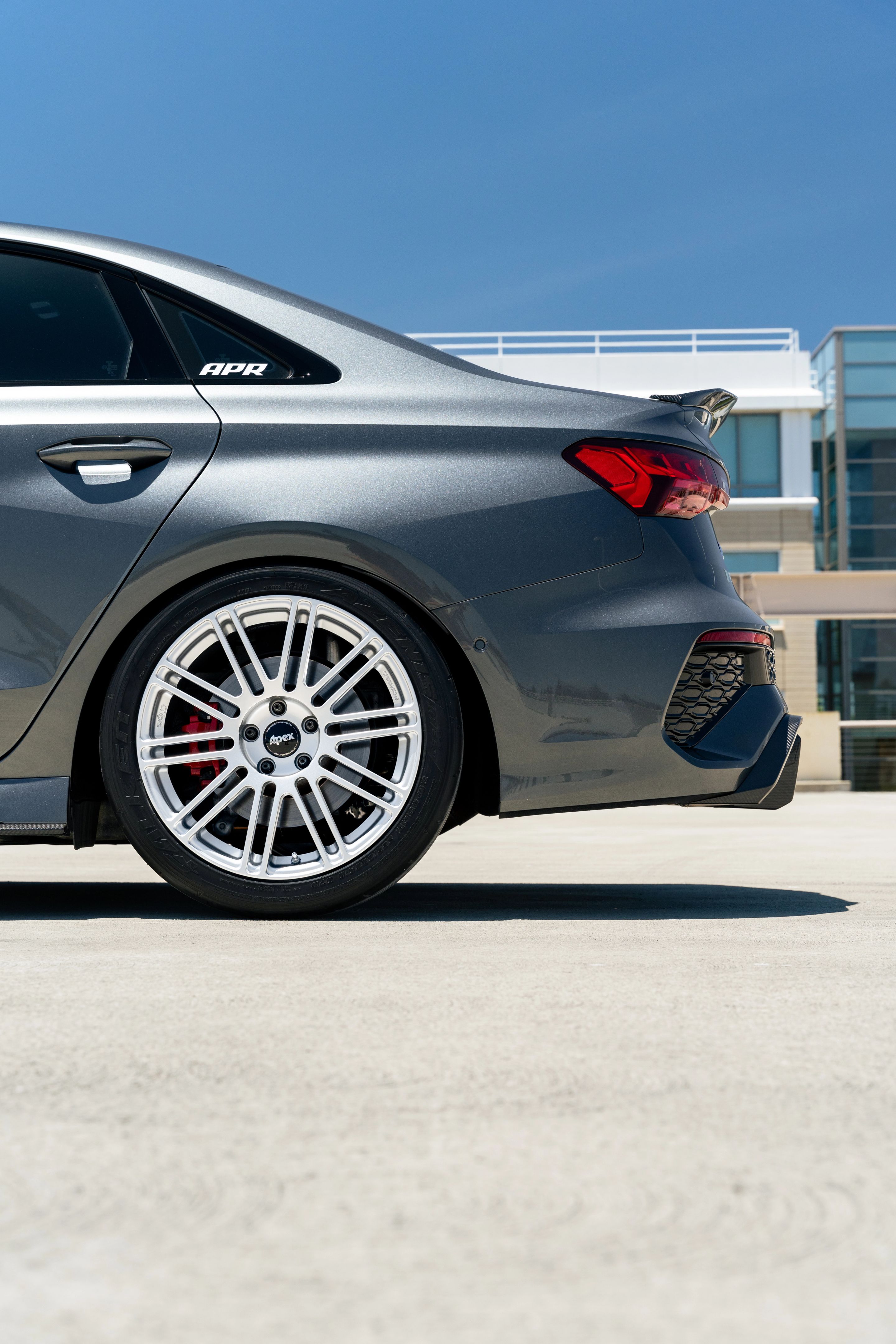 Grey Audi 8Y RS 3 with 18" TC-10RT Apex wheels in Race Silver