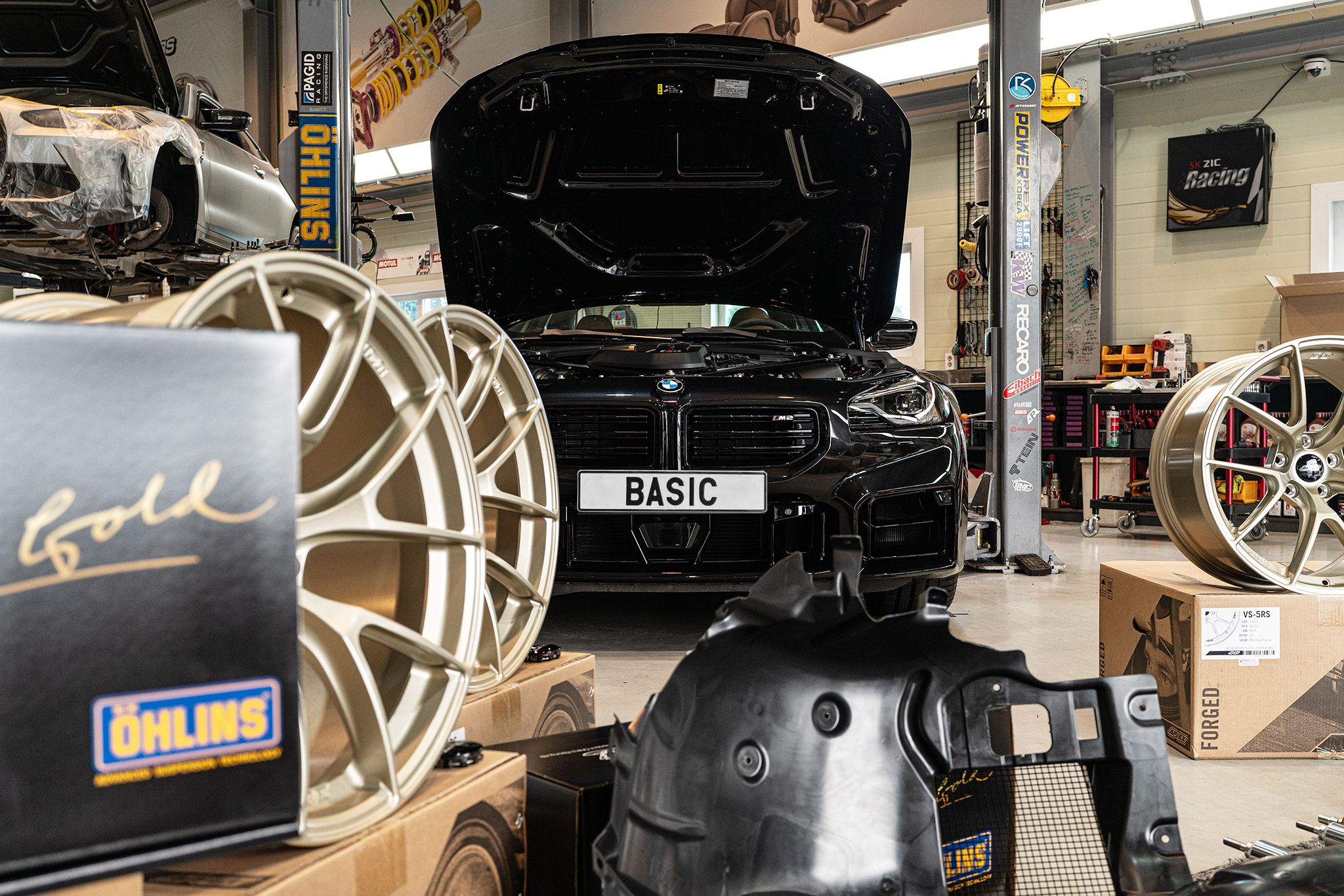 Black BMW G87 M2 with 19" VS-5RS Apex wheels in Motorsport Gold