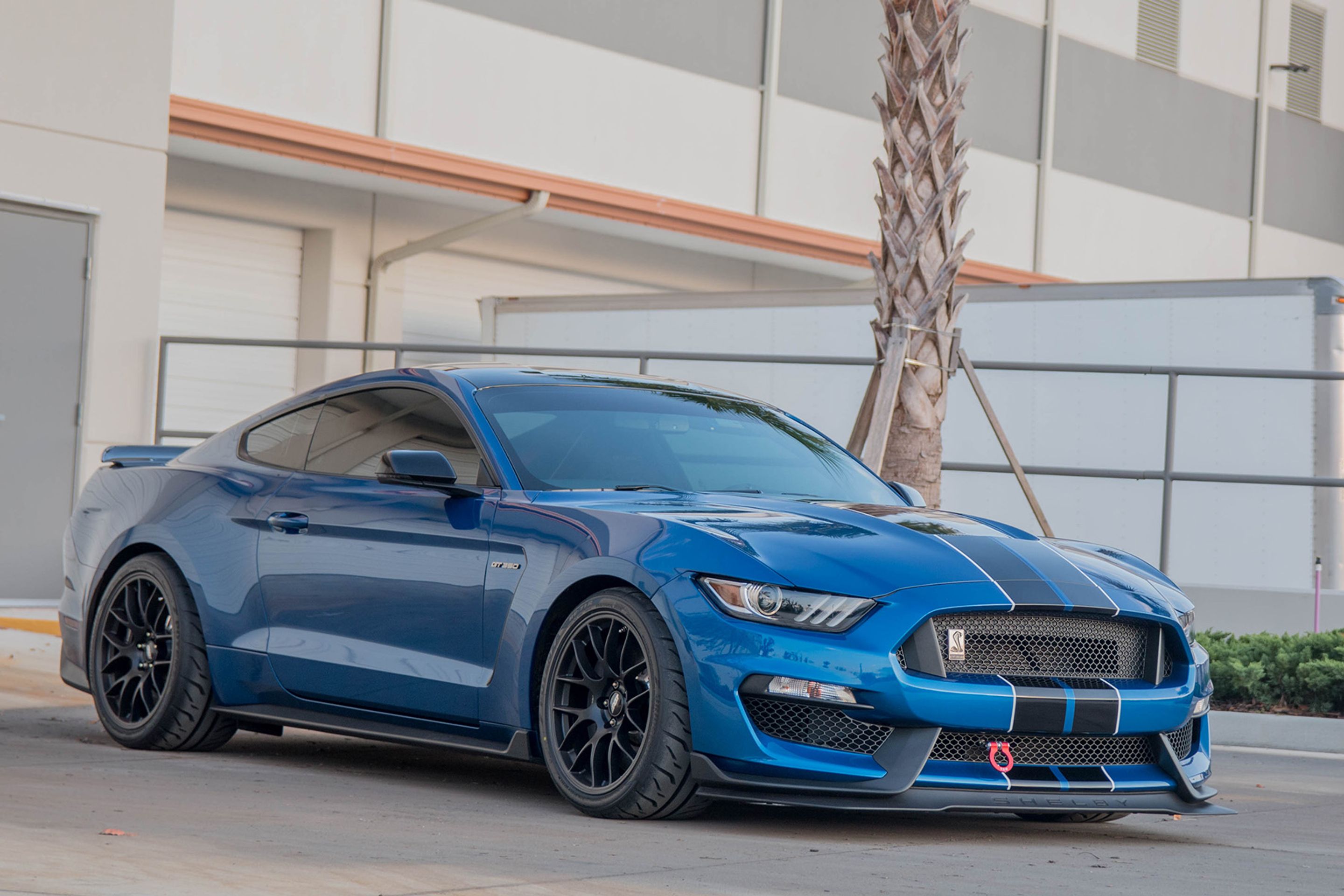 Blue Ford S550 Mustang GT350 with 19" EC-7 Apex wheels in Satin Black